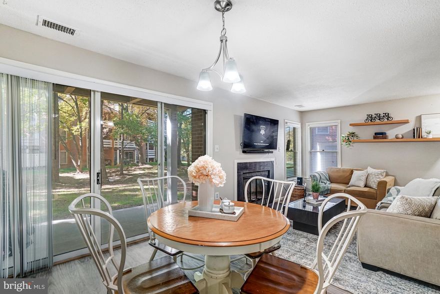 Welcome to 7598 Lakeside Village Dr #L in the desirable community of The Cove! This
beautifully updated 1-bedroom, 1-bath condo offers modern finishes, an open floor plan,
and an unbeatable location. Enjoy brand-new luxury vinyl plank (LVP) flooring, stylish
model-home paint tones, and newer Whirlpool appliances. The open-concept living and
dining area features a cozy wood-burning fireplace, brushed nickel finishes, and access
to one of two private patios, perfect for enjoying the peaceful surroundings. 
The owner's suite includes a ceiling fan, closet organizer, private patio access, and an
en-suite bath with elegant gray tile. Additional features include a stacked high-efficiency
washer and dryer, new Carrier HVAC, and abundant natural light throughout. 
The HOA offers fantastic amenities, including a scenic lake, a clubhouse, a swimming
pool, and walking paths — perfect for enjoying the outdoors and relaxing within the
community. 
Located just minutes from major highways, the Metro, Mosaic District, and Providence Rec
Center, shopping, dining, and top employment centers.