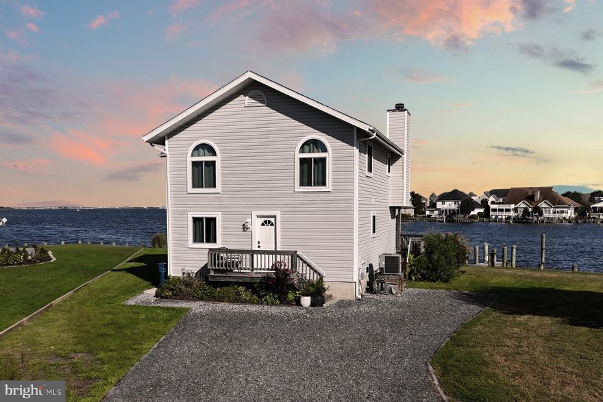 Your Waterfront Retreat Awaits! Discover the ultimate in coastal living at 52 Pintail Drive! This stunning waterfront home in the highly sought-after Pintail Isle community of Ocean Pines. Perfectly positioned at the end of a quiet cul-de-sac, this property offers unmatched privacy and breathtaking panoramic views of the open bay and the Ocean City skyline. Boaters and water enthusiasts will love one of the largest, bulkheaded lots in Ocean Pines, complete with a dock ready for multiple larger boats or jet skis up to 45 feet, the bulkhead has been  replaced in recent years, and this location has a proven track record of accommodating large vessels.
Inside, this 4-bedroom, 3-bathroom home is designed to maximize waterfront living. The first-floor primary suite boasts sweeping water views and a private balcony, perfect for morning coffee while watching the sunrise. Additionally, a spacious bedroom, full bathroom, laundry room and storage room complete the first floor. Upstairs, the open-concept living and dining area flows effortlessly to a sunroom and balcony accessible from both the kitchen and living space, ensuring you never miss a moment of the stunning scenery. Two additional bedrooms and a full bath complete the second floor, providing plenty of space for family and guests.
Whether you’re seeking a vacation getaway, a year-round home, or a proven rental investment, this property delivers. Plus, living in Ocean Pines means enjoying world-class amenities year-round: pools, tennis courts, a marina, a golf course, playgrounds, beach club access, parks, and more!
Don’t miss your chance to make 52 Pintail Dr. your own private waterfront paradise.
Schedule your private tour today!