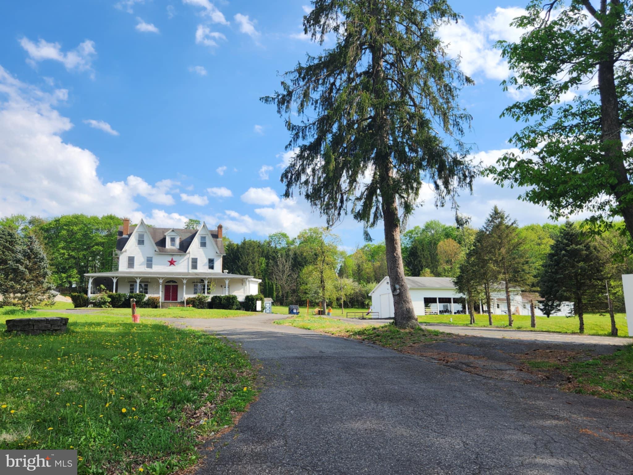 Prime Commercial Property in the Heart of Schuylkill County, PA!
Endless possibilities await at this stunning 7-acre estate, currently operating as The Villa on Bulls Head. This 5,700+ sq. ft. property features a beautifully remodeled catering hall, restaurant, new commercial kitchen, and multiple outbuildings, including a large picnic pavilion and garage.
The spacious home in the process of renovations boasts 5 bedrooms, a living room, dining area, kitchen, family room, bar, and an in-ground pool. A separate 3-bedroom apartment provides rental income potential. Multiple heating zones offer efficiency and flexibility.
With ample space and storage, this property is perfect for a variety of business opportunities—contracting, professional offices, or your next big venture. Live where you work and make the most of this unique investment!