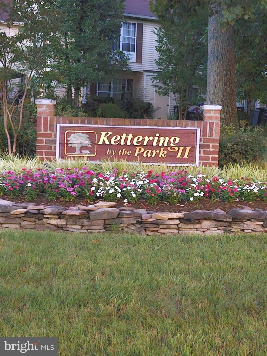 OWNER HAS ACCEPTED APPLICANTS - SIGNATURES PENDING- HOME EXTRAORDINAIRE! Live your lifestyle in high style.  No mowing, no shoveling, just easy living.  Freshly painted one Level condo with low maintenance glowing hardwood flooring, luxurious granite countertops, aesthetically pleasing stainless steel dishwasher, refrigerator and stove with four burners and center grill.   Enjoy a well-lit dining area with enchanting natural lighting, you cannot miss the entertainment ready super-sized living room.  The impressive pass-through window provides connectivity between the living room and kitchen.   You will love the fashionable full-sized washer and dryer.  Both bedrooms boast of having been newly carpeted.  Superb community amenities include nearby restaurants, grocery shopping, Starbucks, shopping mall, banks, schools, bus stop and lots more!  This home is a winner.  Hurry!