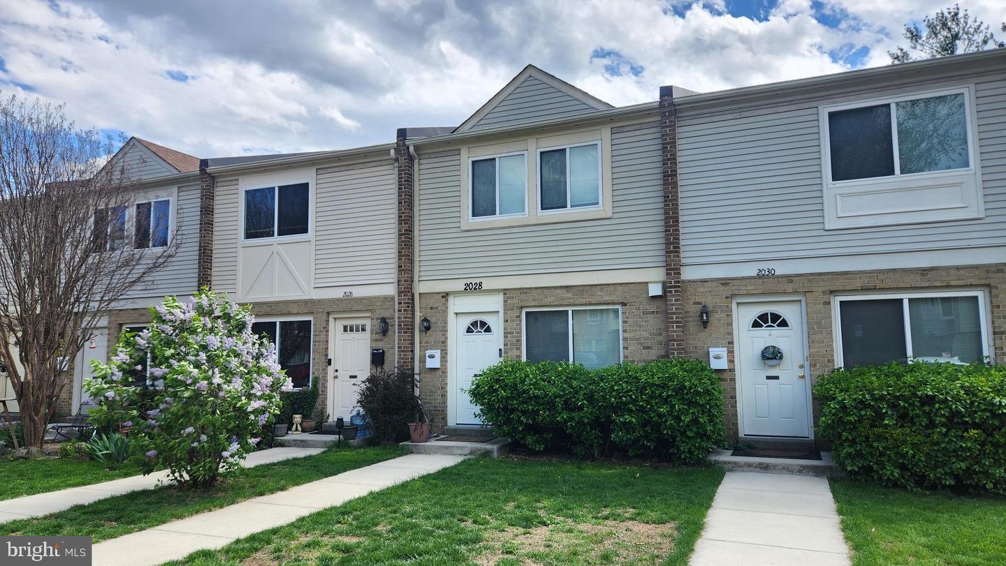Updated townhome with two bedrooms and two full baths on top level. The Living Room features a wood burning fireplace. Newer windows and roof. Fresh Paint, new flooring in Living Room and Bedrooms. Newer water heater and heat pump/AC. 1 car garage plus 1 space in the back and free street parking. No HOA! Close to Ft Meyers, Pentagon, DC, Arlington dining, shopping and night life.