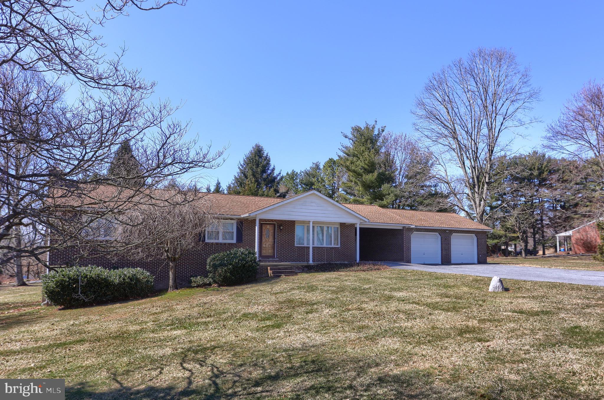 *** This Immaculate, Well -maintained home offers upgrades and improvements Newer Roof, HVAC, and Windows. You will just Love It!! Walk in the Living Room and Gaze out the Sunny Bay window with gleaming hardwood floors, which opens to the traditional formal dining room. The adjacent country kitchen offers plenty of cabinet and counter space, along with table space for an eat-in kitchen. Three nice sized bedrooms include a primary suite with full bath and a family bath complete the main floor. Downstairs, the finished lower level boasts a huge rec room with wood stove, lighting and thoughtful built-ins, plus a full bath and office/craft rooms. There's even a 2nd kitchen in the lower level great for canning or additional cooking space. Outside, the half-acre level lot is perfect for warm weather fun, or your outdoor oasis plans. With an oversized 2 car garage you'll have plenty of room for lawn equipment and projects.