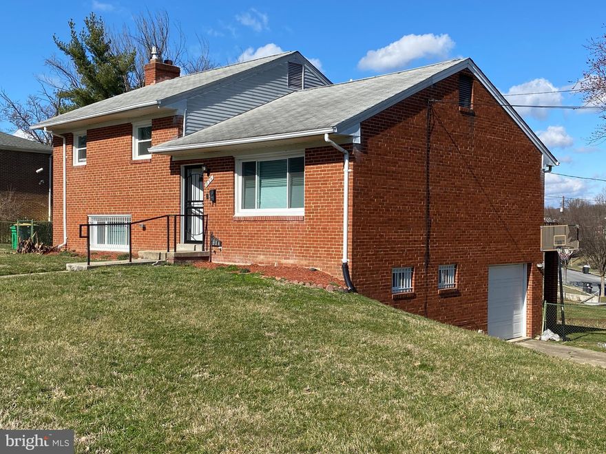 This spacious, 4-level split home boasts beautiful granite countertops and stainless steel appliances in the kitchen. The mainlevel has hardwood floors. The walkout basement has laundry room with ample storage space . A large family room with a wood burning fireplace can be found on the lower floor. Updated HVAC system, windows, and floors, large yard, and 1-car garage with additional storage space. This home has a lot to offer and is conveniently located within minutes of :                                  Metro Bus Stop ( .1 Mile),  Heurich Mobility Playground, Lane Manor Community Park, 38th Ave Neighborhood Park, University Hills Duck Pond, Kirkwood Neighborhood Park, Heurich Dog Park, Kids Goals Soccer Academy, Rollingcrest Chillum Splash Pad, Greenmeadows Rec Center, Fort Circle Parks, Home Depot, Amazon Hub, Mid Atlantic Seafood, Peaches Kitchen and Catering, Honeymoon Chicken, The Midlands Beer Garden, Leylas Restaurant and Lounge, Mi Puebilito Bakery, Dunkin', Starbucks, Culture Coffee Too, Chuck 'E' Cheese, Sardis, IHOP, Pizza Hut, Wendys, Jason's Sub Shop, Chick Fil A, Five Guys, Chicken Rico, Subway, Taqueria,  el Tenampa,Three Brothers, Arbys, Los Laureles, Rio Bravo, PHO 301, Z Burger, Mango Lina, Caribbean Garden, Protein Bar, UNO PHO, Ruff N Ready Crab House, Sizzlys Hotdogs, Riggs Dry Cleaner, Riggs Liquors, Walgreens, CVS, 7-11, Dollar Tree, Walmart, Salem Market and carryout, International Market, Red Apple Farmers Market,Giant Foods,Mega Mart, Aldi, Lidl AND SO MUCH MORE!