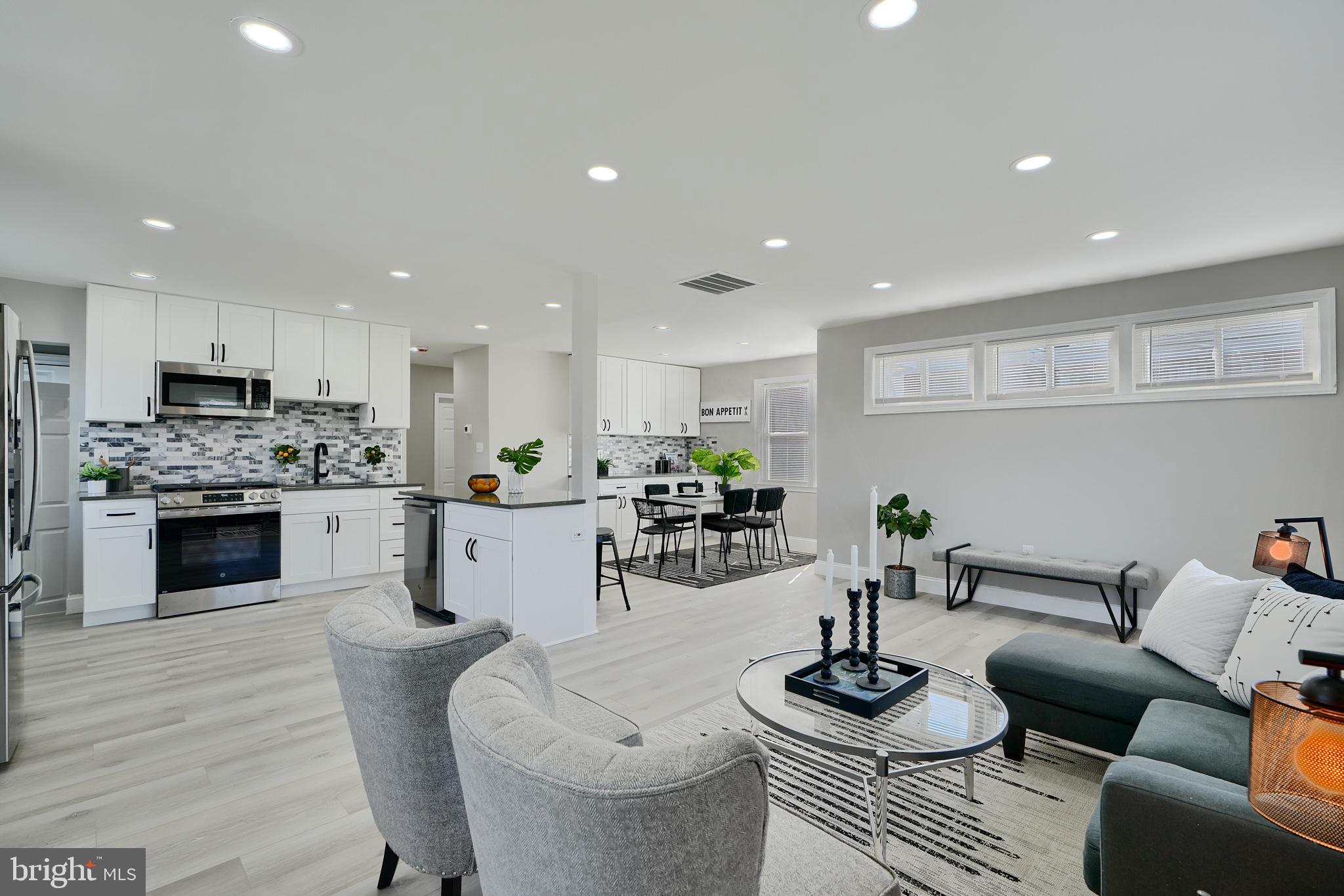 Beautifully Renovated Rancher with Open Layout and Large Open Spaces! Huge Kitchen boasts Quartz Breakfast Island, Lots of Wood Shaker Cabinets, Stainless Steel Appliances, French Door Fridge with bottom freezer, Slide-in Stove, Quartz Countertops and Elegant Backsplash. All new Full Bathroom has a Floating Vanity, Coordinating Designer Lighting & Plumbing Fixtures, and Custom Tilework. Finished Basement includes 2 Bedrooms and an All New Full Bathroom, plus a Large Family Room. Tons of Closets! Replacement Windows, New Luxury Vinyl Flooring, New Heating and Central Air Conditioning, New Interior and Exterior Doors, Recessed Lighting, Concrete Patio. You will Love this Home.