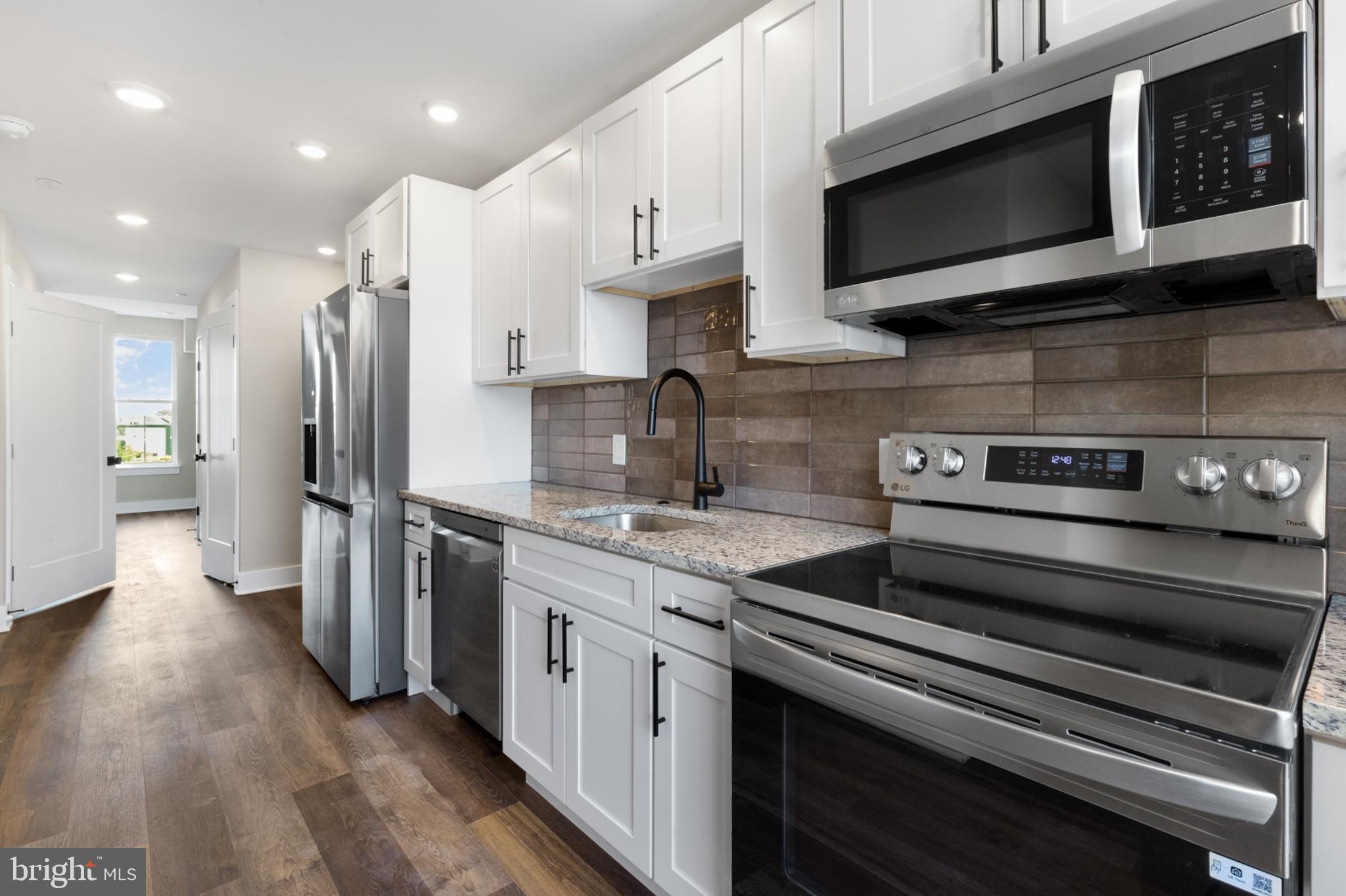 Available NOW | Leasing Special: 1 month FREE on a 13-month lease or 1.5 months FREE on 15-month lease! Gross rent is $1,425/month; net effective rent for a 13-month lease is $1,315/month & net effective rent for a 15-month lease is $1,257/month.
Welcome to Quaker City Flats, a new construction rental community in East Kensington offering 32 modern units designed for those who seek a contemporary, pet-friendly lifestyle. Each unit is a masterpiece, boasting open floor plans, wood floors, and large windows that flood the space with light. The kitchens are equipped with white shaker cabinets, stylish tile backsplashes, and top-of-the-line stainless steel appliances. Luxurious bathrooms feature granite-topped vanities and subway tiled bathtub/shower combos. Convenience is at your fingertips with mini-split A/C systems and in-unit laundry. Unit #507 is a Junior 1 Bedroom apartment on the fifth floor. Our professionally managed building offers amenities including a main lobby and secure package room to ensure peace of mind. An elevator and two stairwells ensure easy access throughout the building. The shared roof deck offers city views, creating an ideal space for relaxation and entertainment. Limited parking is available, with three dedicated spots at the rear of the building for an additional fee. Experience the thrill of modern luxury and convenience in the heart of urban living. Schedule a tour today to discover your new home at Quaker City Flats! Please note: photos & video tour may be from a similar unit within the building; exact layouts & finishes may vary.
Lease Terms:
Generally, first month, last month, and one month security deposit due at, or prior to, lease signing. Other terms may be required by Landlord. $55 application fee per applicant. Pets are conditional on owner's approval and may require an additional fee, if accepted. (Generally, $500/dog and $250/cat). 2 pet maximum allowance. Tenants responsible for: electricity, cable/internet, and a $35/month. Off-street parking is available for an additional $395/month. Landlord Requirements: Applicants to make 3x the monthly rent in verifiable net income, credit history to be considered (i.e. no active collections), no evictions within the past 4 years, and must have a verifiable rental history with on-time rental payments. Exceptions to this criteria may exist under the law and will be considered.
