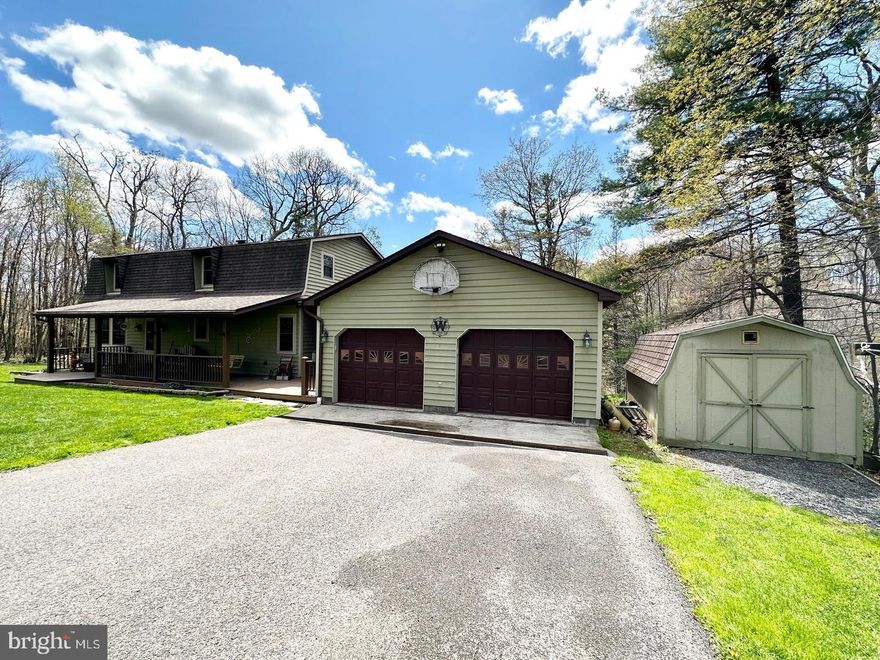 Welcome to this lovely home in the country setting with endless opportunity.  This 5 bedroom/ 2 bathroom home has an incredible layout with plenty of space for entertaining guest inside and out. Located just outside of Oakland and situated on 2.30acres.  The covered wrap around porch is great spot to relax or grill out with family and friends throughout the year.  The main level features large kitchen that leads into the dining room and living room, large bedroom currently used as an office, full bath, and laundry room.  Upstairs offers 4 larger bedrooms and full bathroom.  The lower level is partially finished and is perfect for a recreation, or den area.  With three levels of living space there is plenty of room for everyone.  The whole house offers ample storage.  The expansive grassy yard is perfect for children and pets.  The large two car garage provides plenty of storage.  Many outbuildings such as two barns and two storage sheds. Both barns have electric.  One barn has water and three horse stalls.  This home is nestled on a partially wooded lot that has a convenient location with the privacy and serenity of a country lifestyle.  Minutes away from Deep Creek Lake and Oakland amenities.  Call today!