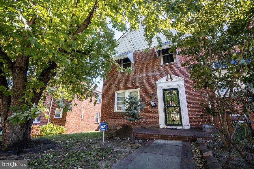 Charming end-unit townhome featuring an open-concept main level that flows seamlessly into a beautifully updated kitchen with a spacious island—perfect for entertaining. Step out to an oversized covered deck with a lovely pergola overlooking a landscaped yard with fruit trees and grapevines. Enjoy off-street parking and hardwood floors throughout. Upstairs offers three bedrooms with custom closets, plus a finished basement with a large recreation room and additional half bath. Home is solid and well-built—just needs a little TLC to make it shine!