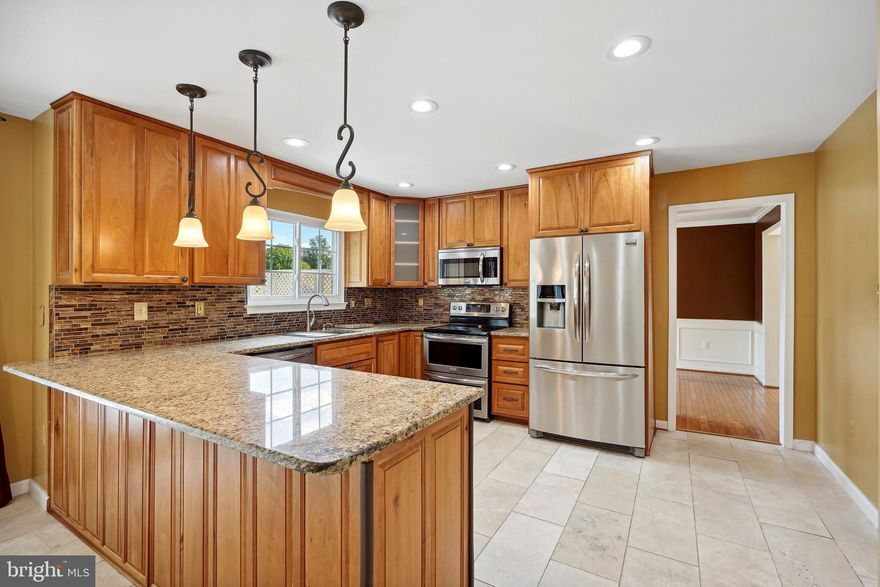 Just Listed in the Stratford Glen Subdivision- Welcome home to your 3,600+ sqft (plenty of natural sunlight!), 5 Bed, 4 Bath home with finished walkout basement and easy to maintain front and backyard privacy. Need to Enjoy the weather, go ahead and sit on your large backyard Deck with HOT TUB! Go ahead and make a nice cuisine to eat in your Gourmet Kitchen. Hardwood flooring throughout main level and 2nd Level-  Brazilian Cherry!  New furnace in 2021, New HVAC 2020, New Roof w/architectural shingles in Nov. 2018, New siding and 4k gutters in Nov. 2018. Also, Parking is a breeze with large driveway + 2 Car Garage! Great commuter route with minutes to route 234 and 395,  Woodbridge VRE train,  Marine Corps Base Quantico , Fort Belvoir, and also quick access to commuter lots, hospitals, grocery stores and shopping through Potomac Mills Outlet Mall and Stonebridge at Potomac Center! Excellent Condition with many features to list here! Schedule a showing today!