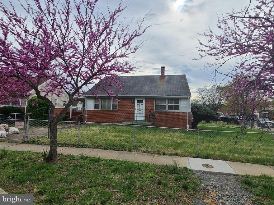 Investors delight! 3 bedrooms 11/2 baths. Needs work , Has great bones! Outside exit from basement, carport and much more. Call agent eith questions.