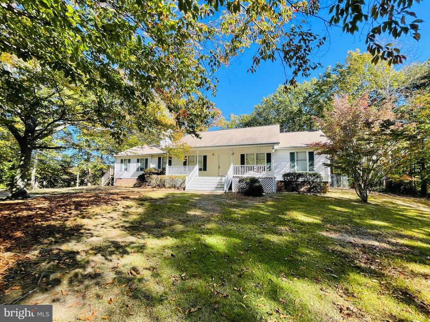 Look no further if you are looking for a spacious home on one acre in North Stafford.  Enjoy the serenity and privacy of nature while close to everything north Stafford.  Walk to Embrey Mill sports fields and  jogging path.  Entertain on the rear deck amongst the mature trees and open yard.  Three large rooms and open kitchen.  Two sided fireplace to enjoy the warmth and ambiance in the family room and formal dining area.  Three large bedrooms.  Fully fenced rear yard with storage shed!  Minutes from I-95, commuter lots.  Easy to Quantico or downtown Fredericksburg.  Come and see this hidden gem today!