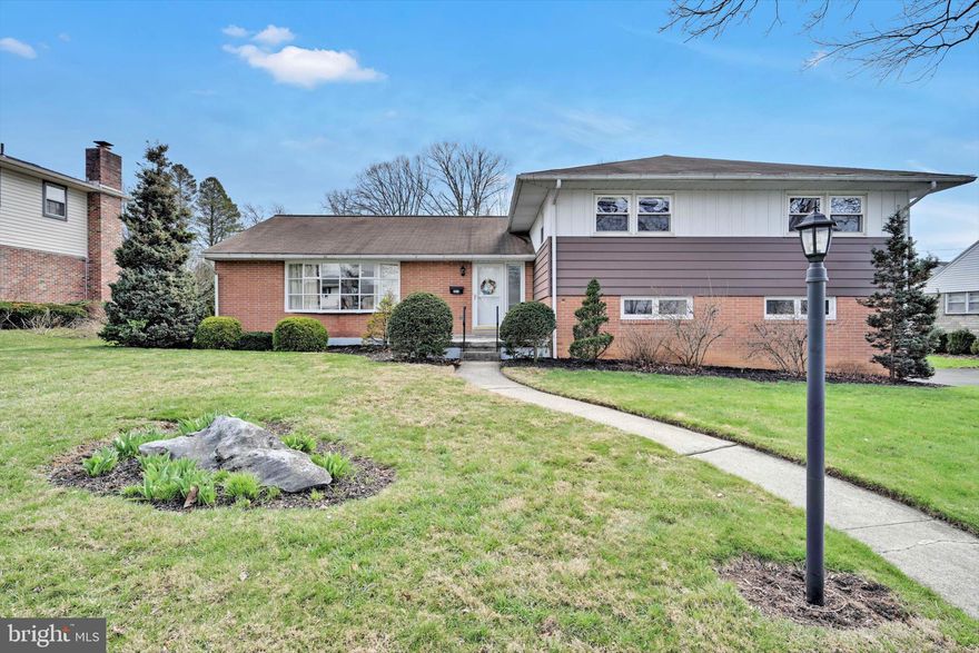 Welcome to this spacious and inviting 4-bedroom, 2.5-bath home offering comfort, functionality, and room to grow in the Wilson School District. Featuring generous room sizes and beautiful hardwood floors, this home provides a warm and welcoming atmosphere throughout. The spacious living room is perfect for everyday living, while the family room with a cozy fireplace creates an ideal setting for relaxing or entertaining. Enjoy the added bonus of a sunroom, perfect for soaking in natural light year-round. The home also offers modern gas heat for efficient comfort, along with an oversized 2-car garage providing ample storage and parking.  The lower level is spacious and ready for you to convert to a home gym or additional living space.  Conveniently located within walking distance to Wilson High School and just minutes from shopping, restaurants, and more, this home combines space, style, and an unbeatable location.