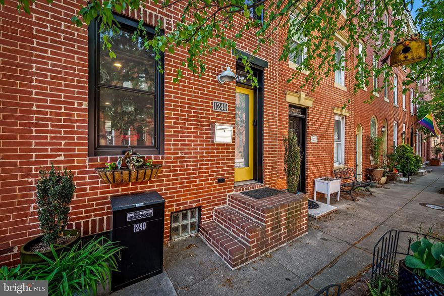 Are you tired of cookie-cutter design? Well then, look no further than this striking Federal Hill residence where historic texture meets modern edge. Welcome to 1240 Riverside Avenue.

Originally reimagined by New Renaissance Architects and Builders, this 4-bedroom, 2.5-bath home is defined by its exposed brick walls, floating steel staircase, and dramatic industrial ductwork, creating a truly one-of-a-kind interior aesthetic. The main living space is both warm and contemporary, with an effortless flow into the dining and kitchen areas.

The kitchen stands out with custom cabinetry, updated appliances, modern tile flooring, and a stylish backsplash, opening to a flexible dining area filled with natural light. From here you can head out to your convenient parking pad and rear outdoor space - large enough to accommodate a grill, plantings and large vehicle.

Multiple living areas—including a cozy lower-level den/home office and an expansive upper family room—offer versatility for entertaining, working, or relaxing.

Upstairs, you’ll find generously sized bedrooms with great natural light. The updated baths add a polished feel. 

Outdoor living reaches its peak on the spacious rooftop deck made for entertaining and unwinding with sweeping panoramic city views that hit differently at sunset.

Extensive updates in the last 5 years include, but are not limited to: replaced windows, new roofing and roof deck surface, replaced HVAC and a new water heater.  This list goes on . . . .

All of this, just moments from the best of Federal Hill—parks, restaurants, and the Inner Harbor—This is the one buyers save, send, and schedule immediately!