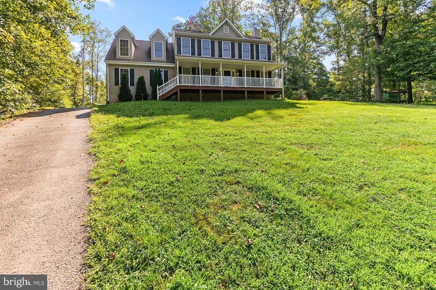 Welcome Home! Secluded Colonial Home with woodland surroundings in Hazel River subdivision. Updated throughout featuring Hardwood Floors, Fireplace, Separate Dining Room, Large Master Bedroom, Extra-Large walk-in closet / Dressing Room (with wood built-ins), 2 Car Attached Garage, New Granite Countertops, New Carpet, Freshly Updated Bathrooms, Large Yard, Covered Front Porch, 3+ bedrooms  and New Trex Rear Deck!