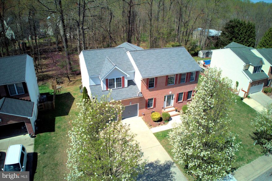 Attention homebuyers: Your dream home is slipping away! Unveiling jaw-dropping new pricing on this pre-inspected Brook Hill Manor masterpiece – a sprawling 4,100+ sq ft stunner that demands your immediate action! Picture yourself in ginormous bedrooms, an upper-level loft retreat, and a lower-level walk-out primed for epic entertainment. This isn’t just a house – it’s a lifestyle upgrade with seller updates galore: a fresh roof, modern HVAC, a chef’s kitchen, and pristine flooring throughout! Three finished levels scream space and luxury, from the four sprawling bedrooms to the fully loaded lower level with a wet bar and endless fun potential. Step outside to a rear deck with serene wooded views and a paver patio with a firepit begging for memories. The clock is ticking – pre-inspection’s ready, spring is coming, and rates are dropping! Loaded with extras like quartz countertops, a kitchen island with seating, stainless steel appliances, exquisite hardwood floors, new carpet, a jetted tub in the primary bath, and a cozy gas fireplace – this is your shot at perfection. Run, don’t walk – stake your claim before it’s gone!  Certified Pre-owned Home -  Inspections Done, Repairs Made, Inspections Include: Home,  Mold/Air Quality, Termite, Sewer Scope and Radon.  2 Year Home Warranty Included !