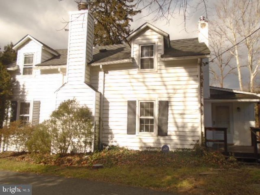 Lots of Olde World Charm in this huge home !!!  Corner built-ins in Dining room and lots of nooks and crannies through out. Enclosed 4 season sun room off kitchen that leads to nice size deck and fenced rear yard. Main level bedroom and full bath. Upper level has 2 bedroom's and full bath.  Fireplace in living room . Family room and bonus room complete the main level. Close to schools ,shopping and entertainment. Easy access to downtown Towson and 695.