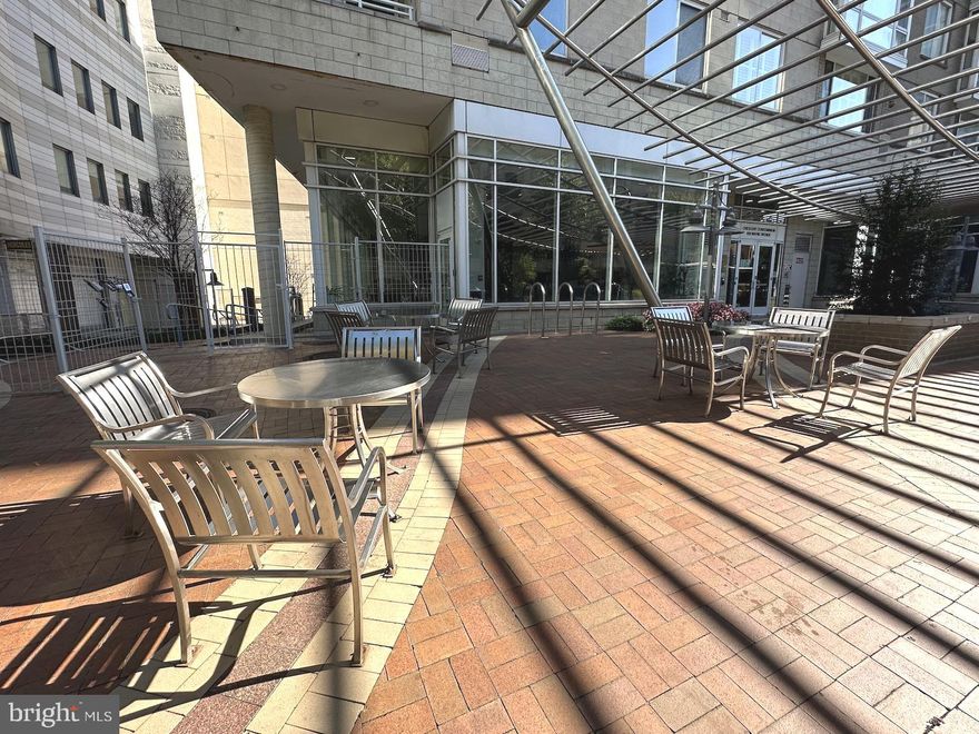 Can't beat this location -- right in the heart of Downtown Silver Spring, just a few steps or rolls to basically any service or amenity you might want or need, including retail, grocery stores, parks, Metro, restaurants, theaters and more!  (Walk Score = 100 (walker's paradise); Transit Score = 88 (excellent); Bike Score = 86 (very bikeable)).  This bright unit boasts great closets, floor to ceiling windows, an in-unit washer/dryer, a reserved garage parking space, and a well-appointed kitchen with granite counters, new dishwasher and a breakfast bar.  The building has a gym, a party room with billiards table and lounging/TV area, on-site management, and secured entry.  Pets considered on a case-by-case basis.  No smoking allowed.