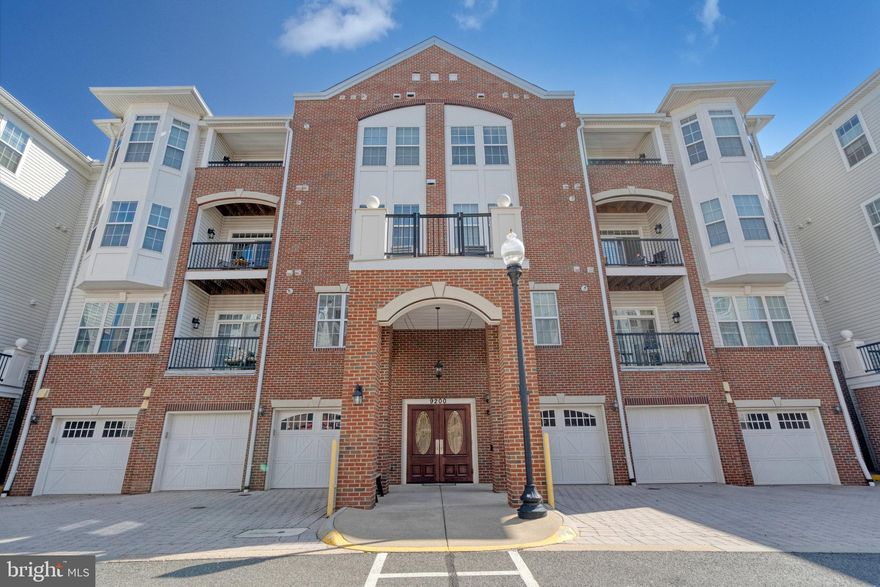 Beautifully Maintained, Corner Unit, 4th Story Condo located in the Active Adult and 55+ Mid-Rise Residence at The Gatherings at Wellington. This Community conveniently has a walking path
that leads to the shopping center that features a public library, several eateries, Giant Food Store, urgent and pet care. Just a short distance away is Old Town Manassas, VRE, restaurants, boutique shopping, museums and parks. 
As you settle into this community you will be able to enjoy the pleasures of a luxury modern lobby with a secure entrance, elevator service, spacious 1Car garage with storage, community clubhouse and exercise room. 
Indulge in a top floor, corner unit, with only 1 shared wall. Enter into an Inviting Foyer detailed w/crown molding and LVP flooring that sweeps you into an Open Floor Plan that accents the separate Living/Dining room that also features a tray ceiling, wainscotting and LVP flooring. The Gourmet Kitchen w/Breakfast Nook is equipped w/SS Appl, Granite countertops, travertine style backsplash and 42' Walnut cabinets.  The Master Retreat boasts a tray ceiling, 4 generously sized windows, LVP flooring,  expansive walk-in closet, luxury on-suite w/dual vanities, soaking tub and a separate shower. The condo has neutral paint tones thru-out, brush nickel finishes, LVP flooring for easy maintenance and durability and GE washer/dryer. The additional 2 bedrooms are separate from one another for optimal privacy. 
The fourth tier balcony is  west facing and offers an abundance of natural light and effortlessly connects to the sunroom with a breathtaking city view.