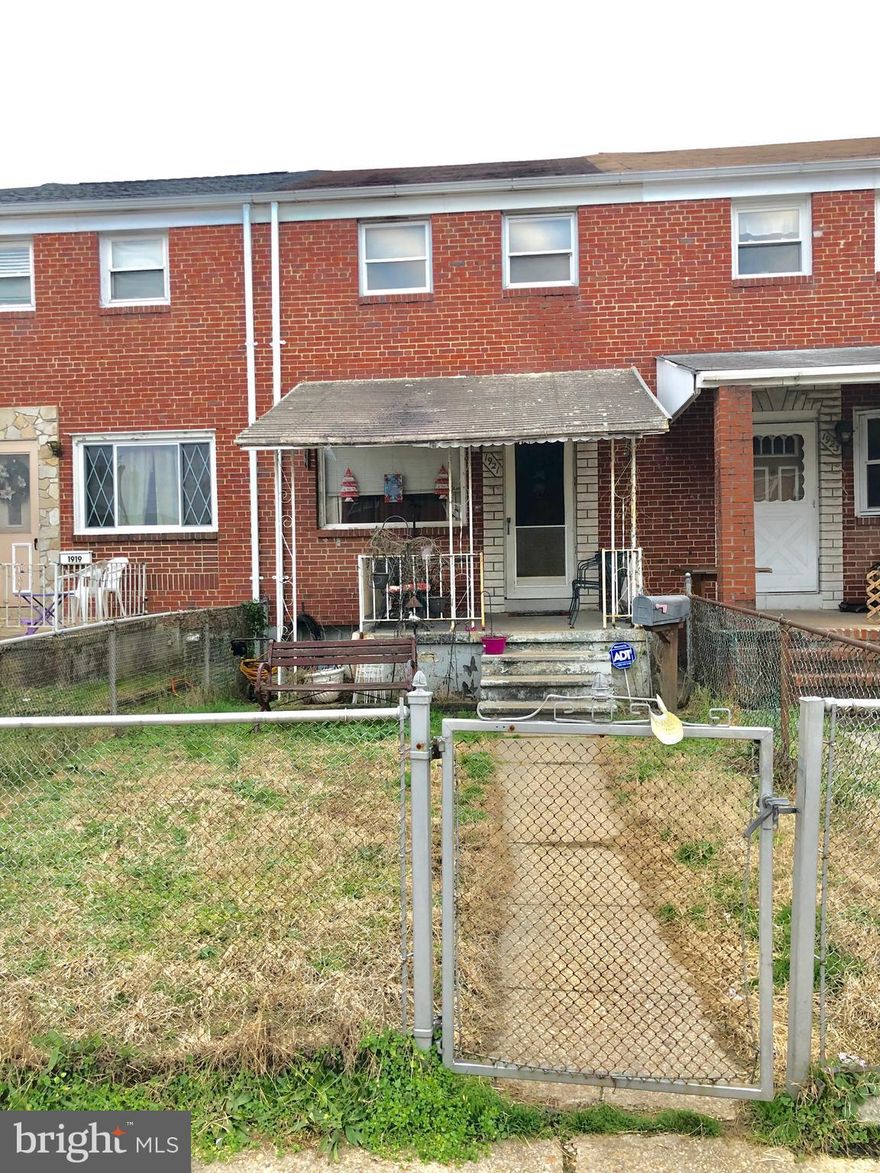 Charming Town home offers 2 bedrooms 1.5 bath, spacious living room and separate dining room. Partially finished basement. Fenced in backyard and parking in the rear. Finishes are dated but with your finishing touches this could be your affordable dream home. Great investment opportunity as well. Seller will make no repairs.