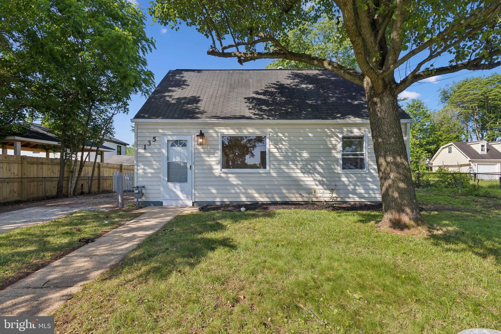Welcome to this charming and beautifully remodeled Cape Cod, perfectly situated in a highly desirable and convenient location. Thoughtfully updated from top to bottom, this home features fresh interior paint, stylish new flooring, and a completely renovated kitchen and bathroom, ensuring a move-in ready experience. The main level boasts a spacious and light-filled living room, along with a stunning kitchen equipped with brand-new stainless steel appliances, modern cabinetry, and sleek quartz countertops—ideal for both everyday living and entertaining. The elegant full bathroom has been fully redone with porcelain tile and a contemporary vanity, offering a spa-like feel. Two generously sized bedrooms are located on the main level, while the upper level offers a private third bedroom, perfect for a guest room, office, or primary suite retreat. Ideally located near major highways, shopping centers, restaurants, and local amenities, this home offers both comfort and convenience in one of the area's most accessible neighborhoods.
