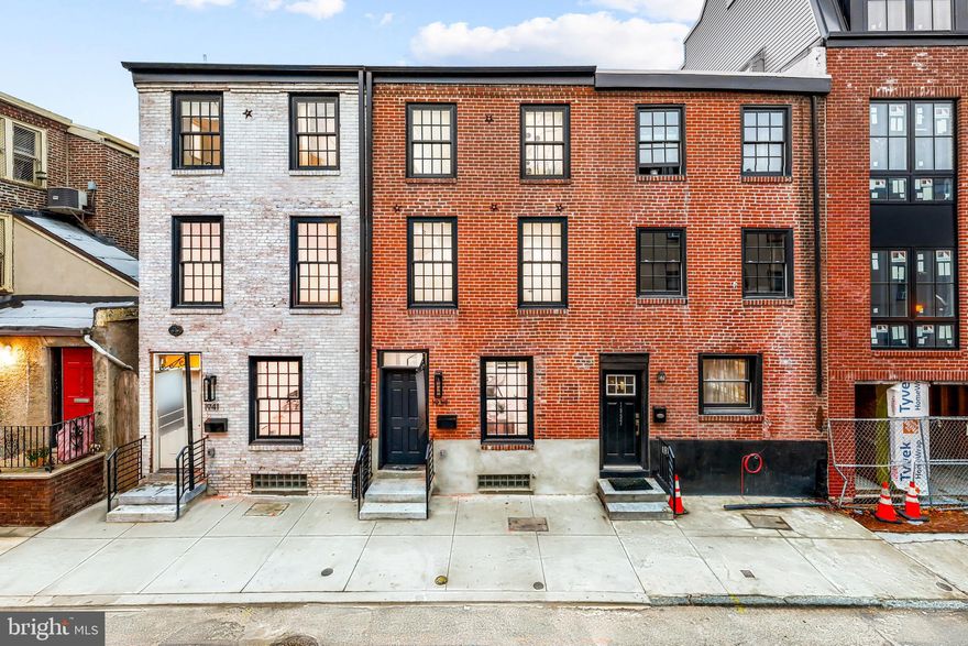 Introducing 1939 and 1941 Waverly Street. These two side-by-side luxury homes are nestled in the heart of Rittenhouse Square. Located on a quiet tree lined street just blocks from all the attractions the neighborhood has to offer--from fine dining to luxury retail and access to the city's most acclaimed parks. Blending designer finishes, contemporary design, soaring ceilings, and open spaces that seamlessly creates a perfectly balanced environment. Offering over 2,500 square feet of beautifully curated living areas, allowing for large-scale entertaining or intimate living. Enter into the open concept living space, complete with a  state-of-the-art kitchen featuring ample space, luxury appliances, and hand-selected finishes. Beyond, you will find a fully finished basement, four (4) generously sized bedrooms and four and a half (4.5) bathrooms providing plenty of space for guests or flexible living for any lifestyle. On the third level, you will find an oversized primary suite including a grand bathroom retreat with dual vanities and oversized walk-in shower. The sun soaked master bedroom leaves no detail untouched, from white oak tambour wall paneling, to expansive windows, and  a walk-in custom built in closet. Offering two (2) color palettes, refined for individual taste--these homes are complete with expansive layouts, ample outdoor space space, and high touch finishes--capturing the essence of urban luxury living. Lastly, 1 year prepaid parking included at a lot near by.