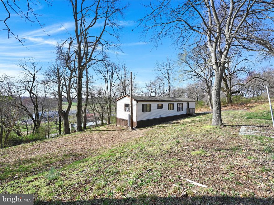 PRIVACY ABOUNDS! Just Renovated 2bed 1 bath PINE GROVE 14x60 singlewide on a private rented lot $600 mo - Pet Friendly - no restrictions. Easy approval process for lot rental. Buyer can purchase 1 yr home warranty if desired.