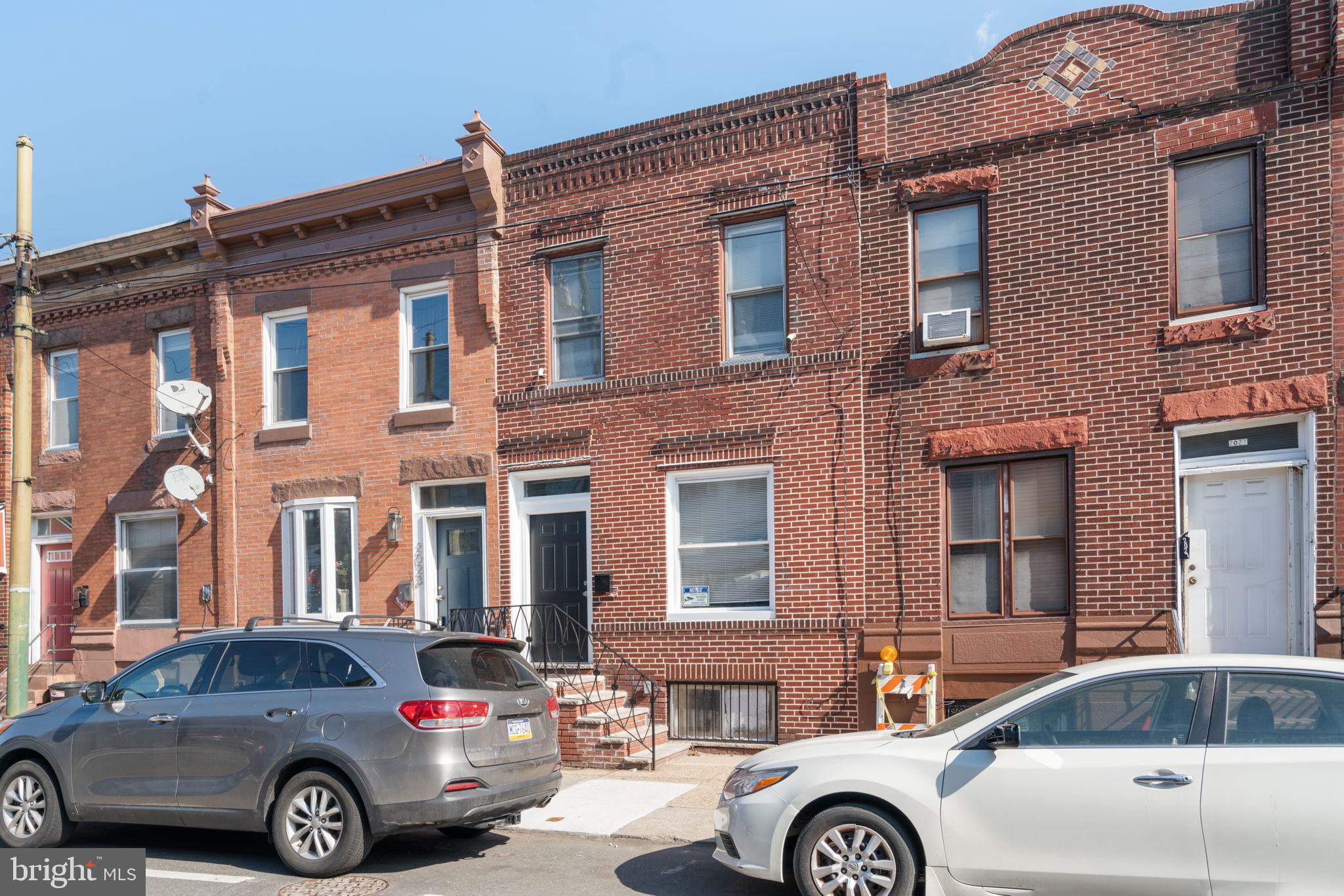 Now is your time to call South Philly your home! The house you’ve been looking for is at 2025 S 22nd Street. Approach a classic brick facade row home and enter into a beautiful, quaint foyer with a penny tiled floor, a unique feature to this house you don’t see often! Enter into the home to see a beautifully, renovated property showcasing, neutral tones throughout all of the new flooring, painting, recessed lighting, and the open concept for you to see all the way back to the kitchen. This straight through design offers functionality for living day-to-day as well as hosting for years to come. The living room area is quite spacious and allows for natural lights to flow through the front two bow windows. Take in the newly installed wrought iron railings, spacious dining area, and fully upgraded kitchen, featuring new cabinetry, granite countertops, as well as a coordinating tiled backsplash to match. The tiled floor also makes quite the statement! Beyond the kitchen is the back laundry room, convenient being on the first floor. Through here you have access to your private patio. Make your way upstairs to discover three bedrooms. The front facing largest bedroom and the middle bedroom share a full bathroom in the hallway, which has a jetted jacuzzi style tub. The back bedroom is ready for your warm welcome as it also has its own full bathroom, showcasing the same aesthetics has seen throughout with a walk-in shower stall. The finishing touches continue as you discover a full finished basement, but first before you walk down, take in the stonewall feature that has been placed. This property boasts all of the modern aesthetics that buyers are looking for today. Consider adding seeing 2025 S. 22nd St. to your list of houses today!