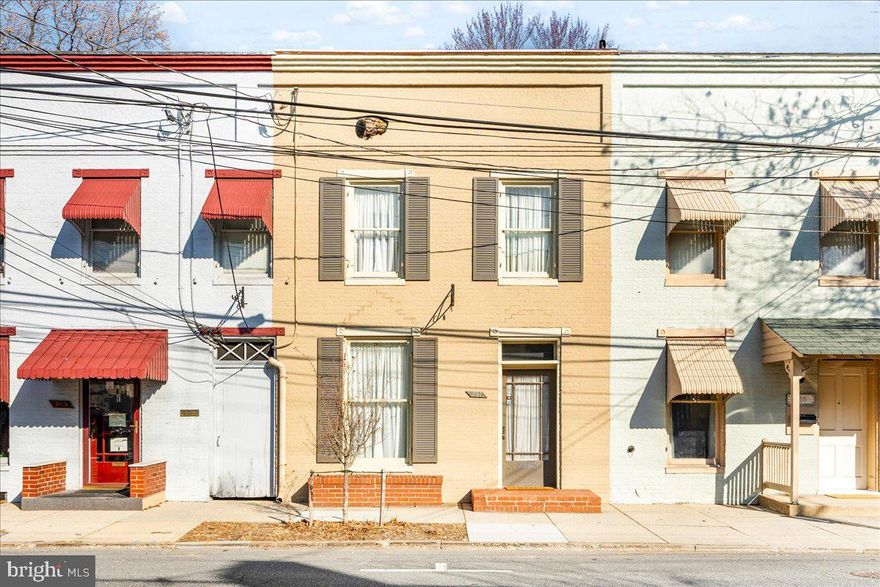 This charming 1,494 sq ft row home in downtown Frederick offers the perfect blend of historic character and modern updates, with zoning for either residential or business use. Freshly updated and move-in ready, the home features a spacious kitchen, three bedrooms, and one and a half baths. Enjoy outdoor living with a covered second-floor porch overlooking the partially fenced backyard. Parking is never an issue with four dedicated spaces in the rear. It is a rare opportunity to own a versatile property in a prime location, just steps from downtown Frederick.  You can even watch the fireworks at Baker Park from your back porch!