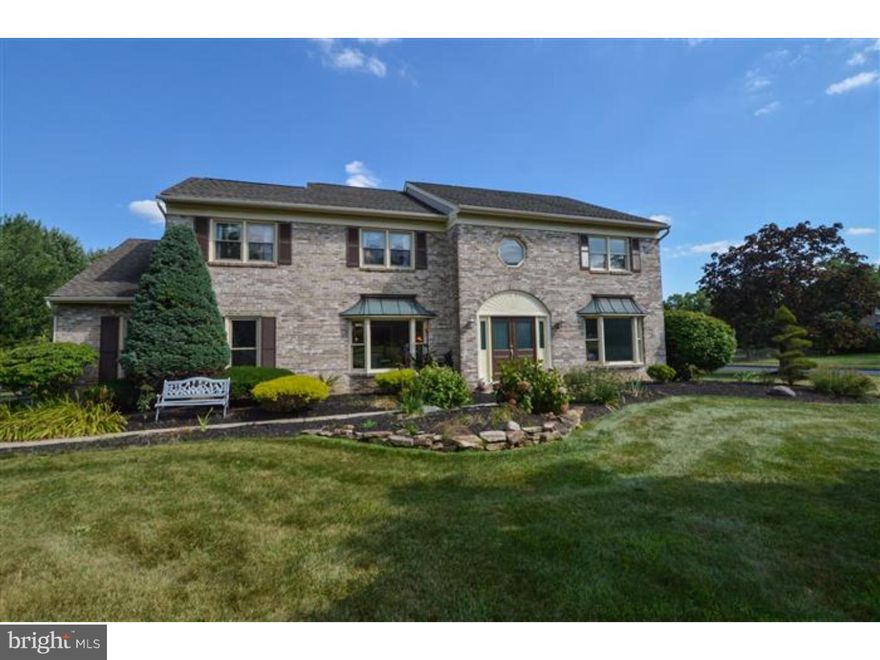 A delightful family HOME! Welcome to this wonderful Upper Dublin brick front, 4 bedroom, 2.5 bath, Colonial HOME with a contemporary flair! This terrific sunlit HOME offers NEWER roof, heater (2010), sump pump (2012), 2 water heaters, Brand NEW carpet, fresh paint & expansive NEW Deck (2013). Brand NEW Front double door entrance greets you as you enter the 2 story foyer with crown molding, ceramic tile floor, divine formal Living & Dining Room with bay windows. Adjacent to the Dining Room is the updated gourmet Kitchen (2011) with Breakfast Room, vaulted ceiling/skylight, granite counters/glass block backsplash, stainless steel appliances, island bar with 4 burner cook top with grill, double wall oven (one is convection), NEW sliding glass doors to Deck. Both Kitchen & Dining Room feature Bamboo hardwood floor. Mud Room (former Laundry Room), highlight built-ins, utility sink & NEW door to Deck & exit to Garage. Family Room with granite wet bar with shelves, brick wall Fireplace with hearth & bay window, Powder Room with ceramic tile completes the main level. Stairway with NEW hardwood leads to a massive Master Bedroom luxury Suite with double door entry, hardwood floor, sitting area, vaulted ceiling, walk-in closet, NEWER luxurious Master spa like Bathroom (2008) with sauna, huge shower with 2 rain heads, radiant heat, ceramic tile & linen closet. 3 additional spacious Bedrooms serviced by NEWER Hall Bath (2011) with double sinks! Fantastic Finished Walk Out Basement (approx 1000 sq ft of additional living space) with NEW Bilco Doors, laminate floor, storage, & plumbed for a Full Bath! 3 additional finished rooms with many possibilities! Great for REC or Play Room, Fitness & or Offices!  This terrific HOME also features Grohe faucets, crown molding, chair rail, recessed lighting, ceiling fans, custom built closets, some NEW windows, security system, 2nd floor Laundry (can be relocated to first floor), 2 Car Side entry Garage with built-in shelving, cabinets, & keyless entry. This splendid Cutler built HOME on over 1/2 acre is sensational for entertaining! Located in a super neighborhood & convenient to major routes (Turnpike, Rte 309), shopping, restaurants, parks, 2 train stations, & Award Winning Upper Dublin School District with Newer State of the Art High School! Truly in MOVE IN CONDITION! Rare Opportunity!