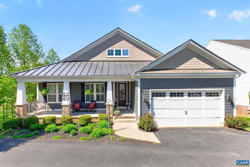 Set gracefully along the shimmering pond and the 18th fairway in the sought-after Spring Creek community, this beautifully crafted home offers the perfect balance of refined design, relaxed living, and exceptional views. An open, light-filled floorplan is enhanced by soaring 9-foot coffered ceilings & an effortless flow designed for both everyday living & elegant entertaining. The heart of the home is a thoughtfully appointed kitchen featuring granite countertops, a farmhouse sink, double wall ovens, induction cooktop, & a generous pantry?ideal for both the casual cook & the seasoned host. Expansive windows invite natural light throughout, drawing your eye to the tranquil pond & golf course beyond. Outdoor living is simply exceptional, with two distinct rear porches designed to suit every mood. Enjoy cozy evenings by the pass-through gas log fireplace on the screened porch, or take in open-air views from the adjoining deck?both perfectly positioned to capture the beauty of the landscape. The walkout lower level features 9-foot ceilings, a generous recreation room, a private fourth bedroom with a large walk-in closet, & a full bath. French doors open to a covered patio, creating a seamless indoor-outdoor connection.,Wood Cabinets,Exterior Fireplace,Fireplace in Family Room