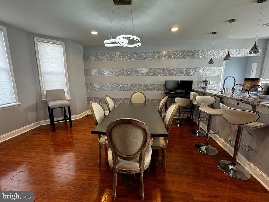 Come and spread out in this renovated Cape Cod full of character and charm with modern renovations! Updated gourmet kitchen with granite countertops, luxury vinyl flooring and stainless steel appliances. The breakfast bar - opens to the sun drenched dining room. Gleaming hardwood floors throughout. Two Spacious master suites w/ custom tiled ensuite bathrooms. Huge backyard with deck, great for outdoor Entertainment. The basement is fully waterproofed and currently used for storage. Great investment as its near Morgan State University and local hospitals.