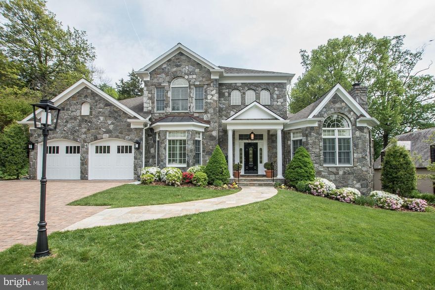 Enjoy 6,300 SF in this Wonderful stone and brick home located Country Club Hills - steps to Washington Golf and Country Club.  A refreshing layout  (see attached floor plans) with the main level offering 10' ceilings, beautifully refinished hardwood floors, main level master suite, laundry room, mud room, kitchen family room, huge 2 car (heated) garage, custom stone patio with water feature. Gourmet Kitchen.  3 Zone HVAC.