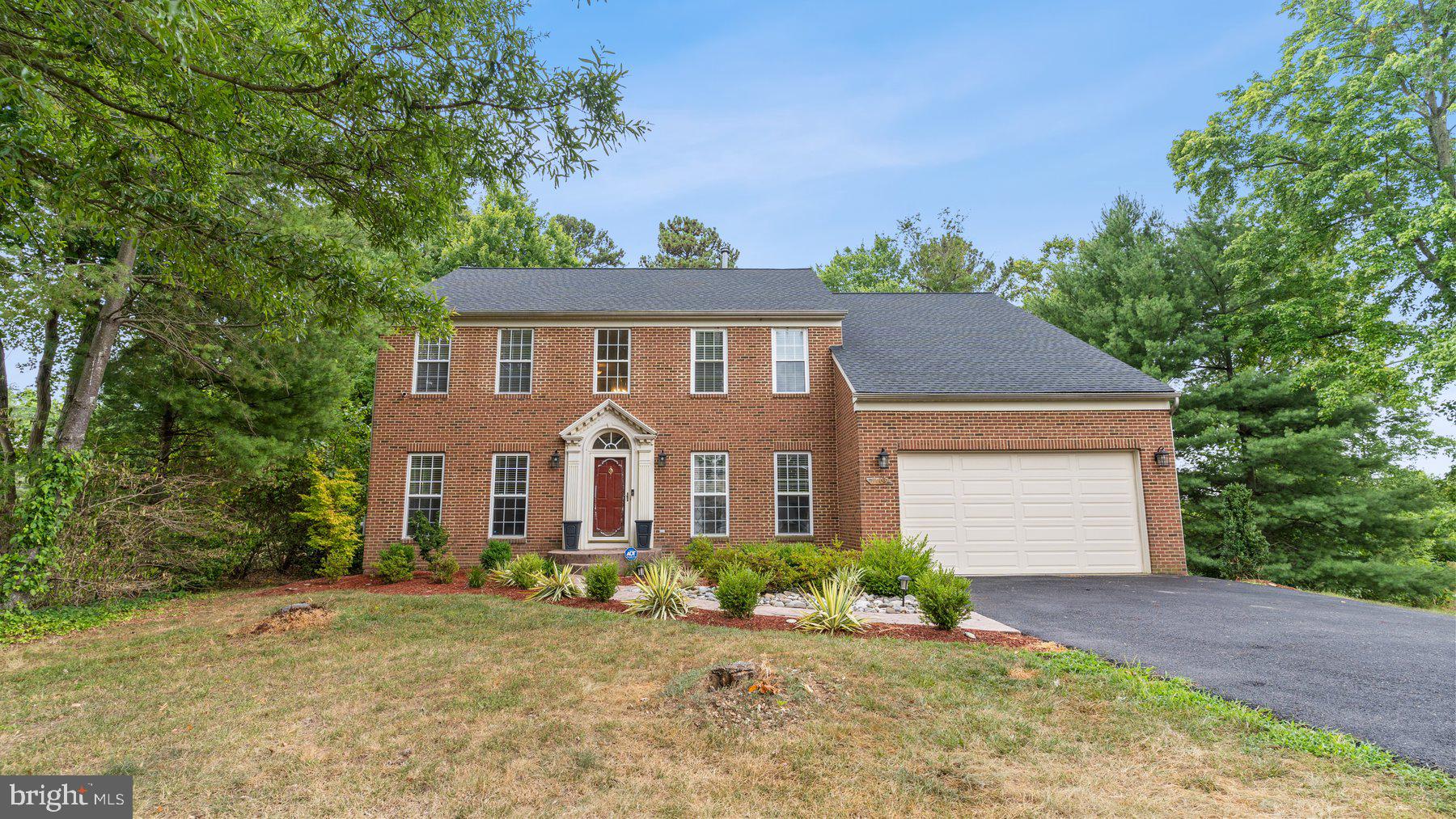 Welcome to this magnificent, brick-front colonial in sought-after Mary-Catherine Estates. This beautiful home is situated in a prime cul-de-sac location on .78 acres. It boasts an excellent open and modern floor plan. The heart of the home features a gourmet kitchen with granite counters and new stainless steel appliances. An inviting family room seamlessly flows from the kitchen. Enjoy direct access to the deck with views of open space and trees., The generous and outstanding owner’s suite provides a sumptuous retreat with two walk-in closets, a sitting area, and an en-suite spa-like bathroom featuring a double-sink vanity, separate shower, and a soaking tub with jets. The upper level also features three additional bedrooms and a hall bath. The fully finished basement level includes a full bath and a spacious recreation room, that offers additional living space for multiple purposes. This home perfectly combines elegance and comfort in an ideal location . Don't wait to make this awesome home yours.