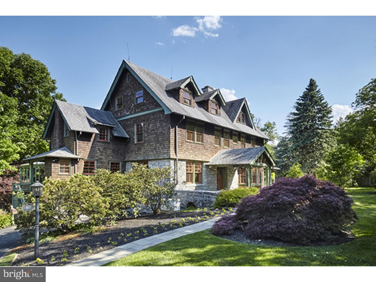This incredible South Wayne Estate Home has been impeccably restored, renovated and expanded with great attention to stunning details, beautiful craftsmanship and exquisite materials. It is set on a gloriously landscaped flat lot in a coveted "walk to" location. Move right in and enjoy the original oak floors, millwork and architectural features, gracious, sizes with an open flow, grand formal oak staircase, restored and authentically reproduced Mercer tile fireplaces, Fabulous Gourmet kitchen with custom cabinetry, soapstone countertops and farm sink, Viking and Sub-Zero appliances, sun-filled family room off of the kitchen, luxurious Master Suite with sitting room and marble bath featuring an over-sized frameless glass shower and soaking slipper tub, new systems, restored exterior shingles, private fenced yard, the list goes on. A real treasure.