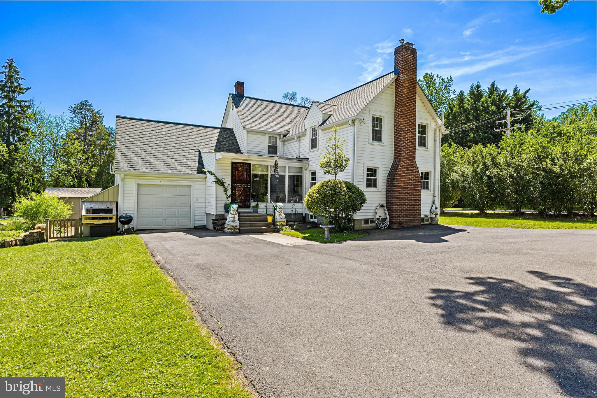A remarkable property in the heart of Timonium! Over the past 10 years, the sellers have painstakingly restored this 1923 farmhouse with love and care, creating a one-of-a-kind homestead full of character, space and thoughtful updates for care-free living, all on a .75 acre lot! The inviting interior includes a generously sized MAIN-LEVEL PRIMARY BEDROOM SUITE with an oversized walk-in closet and private bath. The centrally located kitchen, updated with newer appliances, custom shaker Diamond brand cabinets and an enormous WALK-IN PANTRY, anchors the home for everyday ease and flow. There are two living rooms, plus a massive family room with 9-ft ceilings, projector with 120" fixed-frame mounted projection screen (perfect for gaming and movies) & ceramic tile floor. There are two beautifully restored wood-burning fireplaces, the HVAC system was fully replaced in 2020, and both basements—yes, two—are waterproofed inside and out, each with sump pumps and active radon systems to ensure they stay dry. The abundant storage space is perfect for home businesses, hobbyists and collectors and includes the garage with spacious loft attic, pull-down stairs to an attic above the huge pantry, full staircase to primary attic between second-floor bedrooms, an additional attic above the primary bedroom suite, plus the 2 waterproofed basements, of course!) The main level guest bathroom features charming retro floor-to-ceiling tilework, a vintage-style vanity, and a mini alcove tub—perfect for bathing pets or little ones. With four true bedrooms and the potential for a fifth in the lower level, plus three full bathrooms, there’s space to live, host, and grow.
Additional updates include newer roof, water heater, windows, doors, downspouts, gutters with guards, and upgraded plumbing and electrical systems—offering peace of mind for years to come. A circular driveway provides ample parking, and inside, the home remains peaceful and quiet despite its central location. The expansive lot is a true gem, offering space for gardening, pets, or even backyard chickens. Enjoy convenience to major commuter routes, shops, restaurants & BLUE RIBBON SCHOOLS. With no HOA restrictions, this is a rare chance to enjoy space, charm, and freedom—right in the heart of it all.