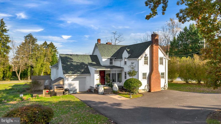 Are you seeking something beyond the ordinary—where character meets convenience? This spacious farmhouse in the heart of Timonium delivers both! Over the past 10 years, the sellers have painstakingly restored this 1923 farmhouse with love and care, creating a one-of-a-kind homestead  completing all integral renovations! Various upgrades include: Complete Roof Replacement, Newly Installed HVAC System, 30 Energy-Efficient windows, Two Repointed Restored Chimneys & Wood Burning Fireplaces, Professional High Pressure sewer line clean out, Gutters w/Guards & Drainage Pipes, Radon Mitagation Systems, Upgraded Plumbing & Electrical... The list goes on & on!
Enjoy your expansive .75 acre lawn where abundant Lilly flowers & Peonies blossom each year.The inviting interior includes a generously sized MAIN-LEVEL PRIMARY BEDROOM SUITE with an oversized walk-in closet and private bath. The centrally located kitchen, updated with newer appliances, custom shaker Diamond brand cabinets and an enormous WALK-IN PANTRY, anchors the home for everyday ease and flow. There are two living rooms, plus a massive family room with 9-ft ceilings, projector with 120" fixed-frame mounted projection screen (perfect for gaming and movies) & ceramic tile floor. There are two beautifully restored wood-burning fireplaces, the HVAC system was fully replaced in 2020, and both basements—yes, two—are waterproofed inside and out, each with sump pumps and active radon systems to ensure they stay dry. The abundant storage space is perfect for home businesses, hobbyists and collectors and includes the garage with spacious loft attic, pull-down stairs to an attic above the huge pantry, full staircase to primary attic between second-floor bedrooms, an additional attic above the primary bedroom suite, plus the 2 waterproofed basements, of course!) The main level guest bathroom features charming retro floor-to-ceiling tilework, a vintage-style vanity, and a mini alcove tub—perfect for bathing pets or little ones. With four true bedrooms and the potential for a fifth in the lower level, plus three full bathrooms, there’s space to live, host, and grow.
.A circular driveway provides ample parking, and inside, the home remains peaceful and quiet despite its central location. The expansive lot is a true gem, offering space for gardening, pets, or even backyard chickens. Enjoy convenience to major commuter routes, shops, restaurants & BLUE RIBBON SCHOOLS. With no HOA restrictions, this is a rare chance to enjoy space, charm, and freedom—right in the heart of it all.