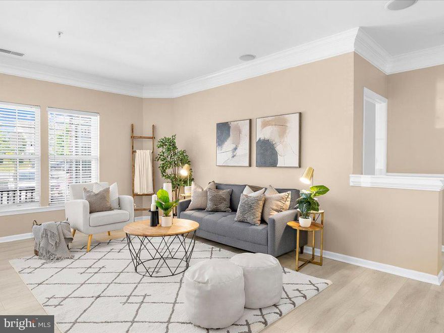 Welcome Home to 205 Secretariat Unit D.  This Beautifully updated First floor Condo has the space you need to create a life you desire.  Boasting an array of sleek finishes throughout this 2 Bedroom 2 bathroom condo has so much to offer!  When you walk inside you're instantly greeted with an open concept layout featuring a spacious living room, dining room, kitchen, 2 bedrooms, 2 bathrooms and laundry room.  The Kitchen boasts S/S appliances and MORE!  Primary bedroom offers extra sitting room, walk-in closet primary en-suite bathroom with double sink vanity.  Walk outside onto your 1st floor porch the perfect spot for relaxation!  BULLE ROCK is one of A Kind, Gated Community featuring Tennis & Pickleball Courts, Restaurant, Full Gym And Workout Center, Billiard Rooms, Library & Meeting Rooms, Indoor And Outdoor Pools And Jacuzzis And More!  Book your private showing today before it's gone!!