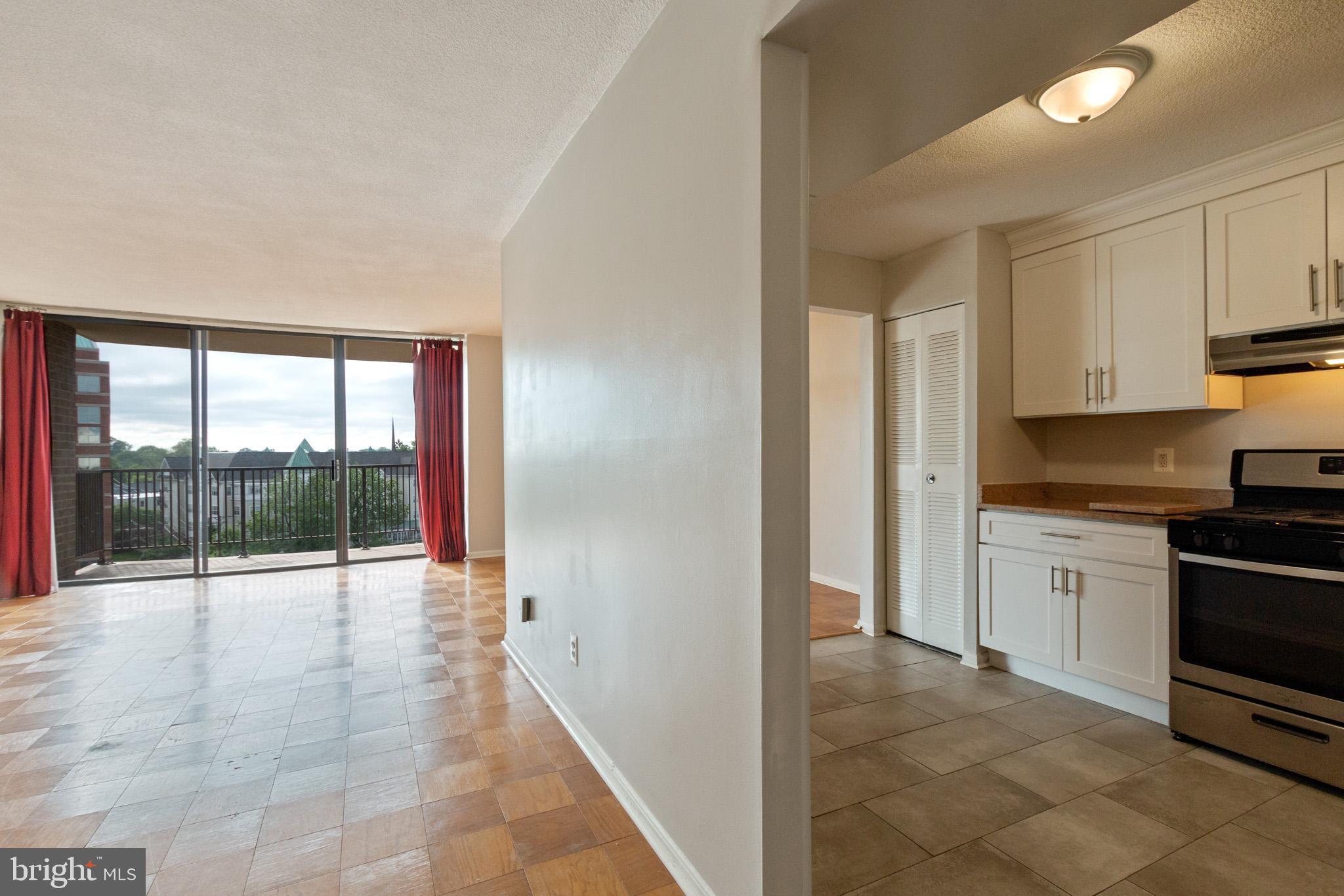 MOTIVATED SELLER - BRING ALL OFFERS! Renovated 1BR/1BA at the Americana with stunning views down the Pike and Southern exposure - best value in the building. Upgraded kitchen with stainless steel appliances and granite countertops. Upgraded bathroom and fresh paint throughout. Free garage parking. ALL utilities include in condo fees, as well as pool, gym, concierge, and more. Steps away from the Rockville metro - view not to be impeded by new construction next door. Walk to Town Center shops, restaurants, and movie theaters. Get it before it's gone.