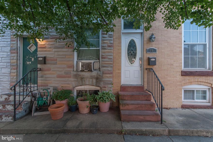 You will fall in love with this Awesome House. Entertain in the open, designer kitchen with granite, stainless steal appliances & wide kitchen island. Relax in the large living area with hardwood floors, exposed brick, crown molding & convenient half bath. Enjoy a great floor plan with private upstairs baths for both bedrooms including an impressive master suite. Your awesome fully finished basement includes a 2nd den/family room and amazing storage. Plus, benefit form a privacy fenced and teak wood floor backyard patio ideal for grilling or relaxing. Fantastic location steps from Patterson Park, tennis courts & restaurants. Schedule a tour today!