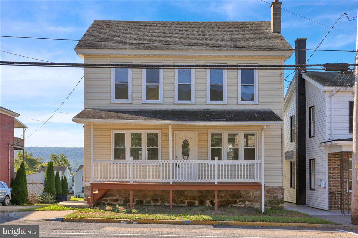 Welcome to this fully renovated gem in the heart of town, within Williams Valley School District! With generous square footage, stylish updates, and a functional layout, this 5-bedroom home offers the perfect blend of charm and modern convenience.
Relax on the large front porch before stepping inside to find luxury vinyl plank flooring throughout and a spacious living room filled with natural light. There is a dedicated dining room with modern lighting. The kitchen, boasts brand-new stainless steel appliances, bright white cabinetry, a sleek tiled backsplash, and access to the deck—ideal for indoor-outdoor entertaining. A convenient half bath is located just off the kitchen.
Upstairs, you’ll discover a HUGE bathroom with double sinks and a walk-in tiled shower, along with comfortable bedrooms offering plenty of space. The third floor provides two additional bedrooms, perfect for guests, a home office, or playroom.
The full walk-out basement adds even more possibilities, whether you need storage, a workshop, or future finished living space. Outside, the expansive deck—accessible from both the kitchen and dining room—creates a fantastic spot to relax or host gatherings. Additional highlights include central air and thoughtful updates throughout, making this home truly move-in ready.
With 5 bedrooms, multiple living spaces, and modern finishes, this beautifully redone home is a rare opportunity in the heart of town—don’t miss it!