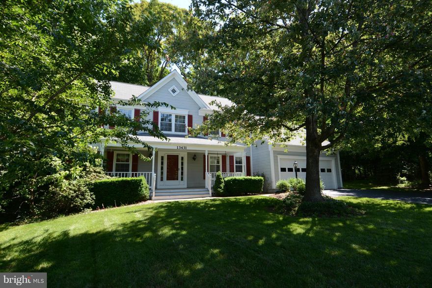Meticulously maintained colonial on almost an acre of privacy! Newer windows, heat pump, water heater and roof! Updated kit with all newer appliances. Doors off the fam rm open to a private deck and backyard that backs to woods. Basement has full BA, rec room, separate den, work room & storage room. Main level den possible 5th bedroom. Fantastic commuter location! Close to commuter lots and I95.