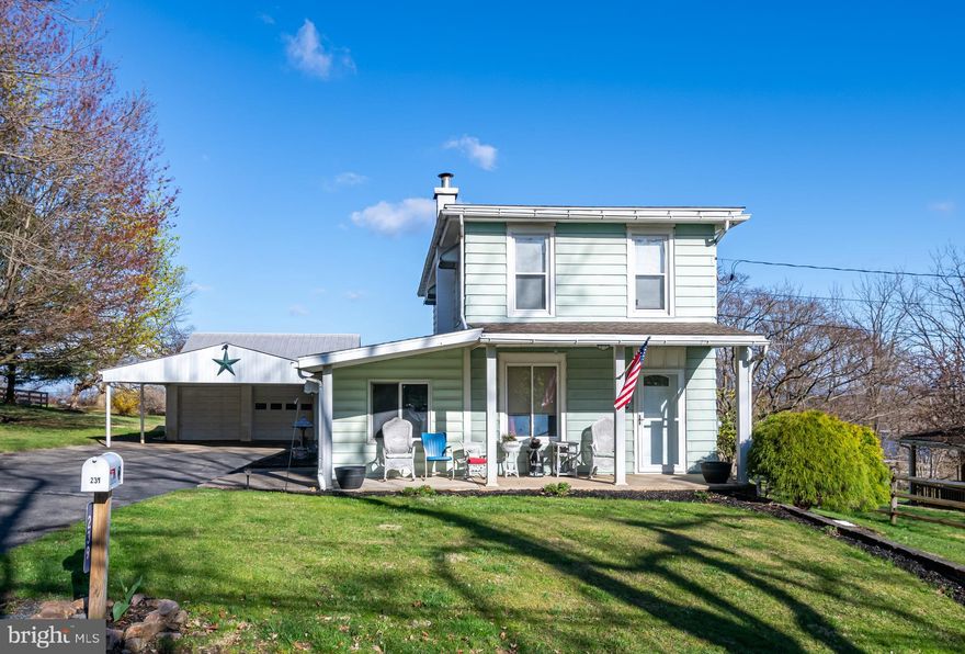 Your new beginnings start here!  Welcome to this beautifully updated home ready and waiting for you.  As you step inside you will be greeted by neutral tones and beautiful woodwork throughout.  The living room is accented by a wooden staircase leading to second floor.  Work from home??  Your corner office awaits!..off the living room with lots of natural light pouring in.  First floor powder and laundry room feature custom cabinetry along with washer and dryer to help get you started.  Awesome kitchen features plenty of counter and cabinet space with all appliances included to keep your moving budget in line.  Dining area has lots of windows and steps out to the driveway and backyard from here.  Spacious yard offers room to roam for loved ones along with great views and deck perfect for entertaining or relaxing.  Lots of off street parking and two car garage to keep you out of the elements.  Updated plumbing and electric give you peace of mind.  Wonderfully appointed upstairs is perfect when its time to unwind from a long day.  Big bathroom has been remodeled for your comfort.  Terrific location is just outside of town offering the countryside feel but still connected to public sewer for peace of mind.  This is the one you have been waiting for.  Welcome home!