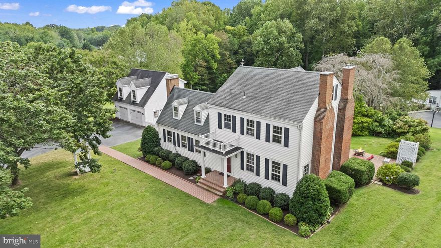 Own a Piece of Timeless American History!“Small Reward,” built in 1723, is for sale. This home is the perfect blend of American history and contemporary updates. However, despite thoughtful upgrades throughout and contemporary finishes, the history of this home has always been respected. It is located in very desirable Huntingtown, Maryland. Small Reward is the perfect blend of privacy, comfort, and modern living. The house has soaring ceilings, beautiful original 1st-growth chestnut hardwood flooring combined with heart of pine flooring added to the federal wing in the 1850s throughout, and an abundance of natural light, which creates a welcoming space ideal for both entertaining and everyday living. The home has four generous bedrooms and three and one half baths. The spacious primary bedroom has an ensuite bathroom which just was recently upgraded completely. There is a wonderful clawfoot tub in the second
full bathroom that has also been completely updated. The Rain shower head in this bathroom has a remote control making it entirely luxurious. The fourth bedroom and third full bath are in the oldest portion of the house, making the space quiet and restful; perfect for guests, adult children or
visiting in-laws. Four wood-burning fireplaces make the home cozy and warm on a cold winter’s night.
The gourmet chef’s kitchen has been thoughtfully updated, seamlessly blending modern conveniences with the home’s period-appropriate style. The kitchen contains all new stainless steel appliances, quartzite countertops, a large walk-in pantry, a white wine refrigerator, storage for red wine, a coffee station, and beautiful new hardwood floors. There is a large area for your family to gather for informal meals, overlooking the magnificent garden from every window. For more formal occasions, there is a beautiful dining room and parlor, each with one of the four fireplaces. Outside is a private patio offering a peaceful outdoor retreat and a two car garage with a large second floor ready to become a private, sunny area for
writing, painting or simply exercising in a huge gym. This house has been freshly painted from top to bottom. Other recent upgrades include the restoration of some of the original brass hardware and 
new lighting throughout. The cellar of the house could easily become a large wine cellar.
The home is situated on a verdant and lush property with a thick abundance of plants, mature trees, and manicured lawns. Huntingtown’s school district is top rated and the home is in close proximity to shopping, restaurants, parks, beaches and walking trails. Don’t miss this unique opportunity to be the next steward of this magnificent home. Schedule a private showing today and discover the endless stories held within its walls. Once you move in, the only thing you will need to do is kick off your shoes and convene with nature. Everything else is done for you!