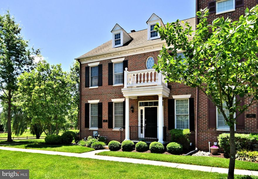 This beautiful end unit Carriage Home in Newtown Walk is impeccable throughout! Freshly painted and in move in condition! Enter to a hardwood foyer, formal living room and dining rooms, perfect for entertaining friends and family. As you continue, you enter the Gourmet Kitchen area with new upgraded countertops, sink and faucet which is located on a large island. Premium stainless steel appliances, wall oven, electric cooktop, wine chiller, new dishwasher and refrigerator. There is also a spacious breakfast area adjacent to the laundry room. Enjoy relaxing in the large and cozy family room with custom built ins, gas fireplace and walls of windows allowing for plenty of natural sunlight to filter in. Sliding glass door leads to custom decking, perfect for outdoor grilling. Above are 3 spacious bedrooms including the Primary Suite with vaulted ceilings, large walk in closets and luxurious bath with soaking tub! 2 Additional bedrooms are on this level and access a hall bath. Below is a full finished basement with plush carpeting, full bath, bedrooms #4 and large great room. There is additional storage space for mechanicals, HVAC, hot water heater and 2 sump pumps, one is a Hydro Static Electric sump pump, alarm system, cable and electrical panel.  Homeowners association is responsible for lawn care, snow removal, trash, common area maintenance and exterior building maintenance.  All this within walking distance to Newtown Boro to enjoy all the things the Boro has to offer!