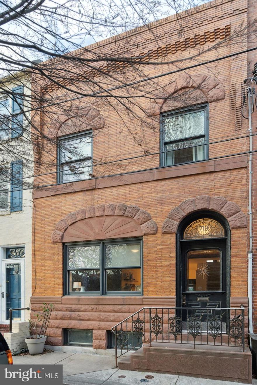 Prepare to be wowed! This is a unique and special home, here are just some of the incredible features; 3 bedrooms, 2.5 baths, beautiful wood floors throughout, many original details, updated baths, central air, hidden den/office, super clean basement, and a 33’ x 64’ yard and garden!  All this is located on a low-traffic block across from Cianfrani Park in the heart of beloved Bella Vista. Upon entering through the original restored front door with leaded glass into the vestibule, you’ll be welcomed into the airy and open living room with beautiful wood floors, a double front window and ceiling fan. The bright dining area features a window, chandelier, and convenient half bath. Into the newer kitchen (updated in 2022), you’ll find marble counters and backsplash, custom venetian plaster finish on the walls and range hood, a five burner Italian Ilve gas stove, refrigerator, expansive island bar counter, recessed lighting, and great ceiling height. The unique, hidden rear office could be used as a fabulous den area and has an abundance of cabinetry, shelving, and recessed lighting. Then into the unmatched garden yard oasis (721-723 R Pemberton Street )(33’ x 64’)(updated in 2022) with evergreen trees, grass, and a brick paver patio, this is a one of a kind and it is a buildable lot if you want to build an additional space for yourself! The second level features a hallway skylight that allows for fabulous natural light to flow in. The beautiful front bedroom suite has original wood floors, great light, and an abundance of closets, plus a lovely full bath with a tile floor/tub area and nice vanity. The middle bedroom has wood floors and a skylight. Full tile hall bath with stall shower and contemporary vanity. The rear bedroom has wood floors, great natural light, and closets.  The lower level is unfinished but super clean and has a water purification system, utility sink, large rear storage area with washer/dryer, and steps to access the rear yard, perfect for the urban gardener in you! Located in the much sought after Meredith Catchment Area! All this is just a short walk to great restaurants, amazing shopping, public transportation and so much more!