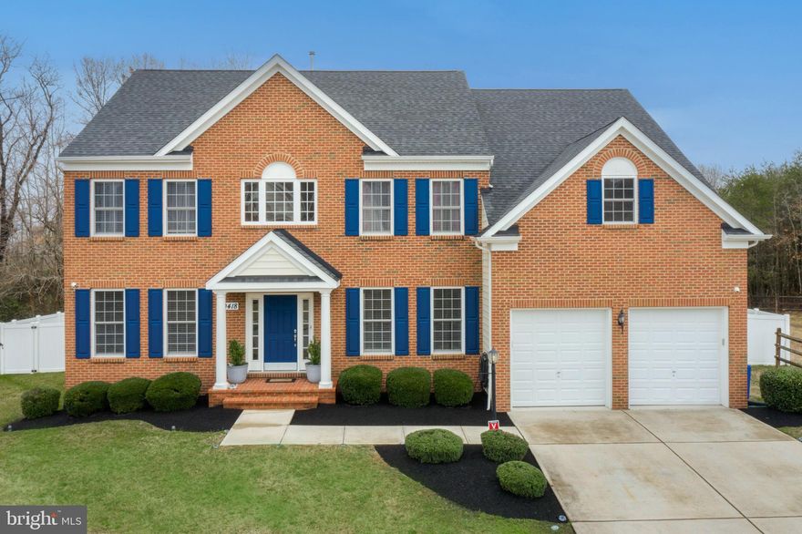 MAGNIFICENT MARLBORO CROSSING BEAUTY - over 5,200 finished square feet with 4 bedrooms and 3.5 bathrooms, a DREAM KITCHEN, fully finished basement, fully fenced yard, luxurious landscaping and pristine paver patio out back. Enter the soaring 2-story foyer with palladium windows.  You are greeted by a cascading staircase with oak railings, oak treds & risers and a neutral carpet runner.  Gleaming hardwood floors lead the way to the immaculate kitchen.  This kitchen is a dream!  Kitchen features include gorgeous granite countertops, 42" white craftsman style cabinets, shining stainless appliances as well as tall ceilings with recessed lighting.  The appliances include double wall ovens, gas cooktop with built-in microwave above, french door refrigerator with ice maker and a sleek dishwasher with hidden controls.  The kitchen island is the heart of this space with a 12" overhang and room for seating!  The kitchen nook is a great spot to enjoy a morning cup of coffee.  A standout feature of this home is the morning room off of the kitchen.  This room was a structural upgrade to the builder floor plan and features panoramic window views into the backyard.  The family room is a wonder all it's own - with soaring ceiling height & masterfully placed atrium windows, allowing an abundance of natural light.  The living room and dining room are spacious! The windows are adorned with full casement trim and the ceilings are stunningly outfitted with wide crown molding. Don't miss the first floor office! The office is located conveniently by the foyer and away from the main living areas and also features a set of glass-lit french double doors. Upstairs you will find 3 bedrooms in addition to the owner's bedroom.  The bedrooms are a good size & share a hall bath with a double sink vanity and white cabinets as well as a shower tub combination.  The owner's suite is large & features double walk in closets and access to it's own private bath.  The owner's bath showcases ceramic tile floors, a roomy vanity with double sinks, a deep corner soaking tub and a separate stand-up shower with ceramic wall tile.  Laundry room is conveniently located on the second floor to make laundry duties a breeze!  There is a FULLY FINISHED BASEMENT with a sizable recreation room, a bonus room/den that can be used as a bedroom, a full 3-piece bathroom and plenty of storage space.  There is a glass slider door that leads out to an extra wide poured concrete areaway with steps up to the backyard.  The backyard is private and backing to mature hardwood trees.  Enjoy an evening with company at your table on the pristine paver patio while watching the kids play on the play set. The yard is fully fenced with a 6' vinyl privacy fence on the sides and black metal fencing along the back for unobstructed wooded views.  The seller thought of every detail! 10418 Sarah Landing Drive is located within close proximity to schools, shopping, restaurants, entertainment and major commuter route 301! Sarah Landing Drive is the perfect place to call HOME! Schedule your showing today!