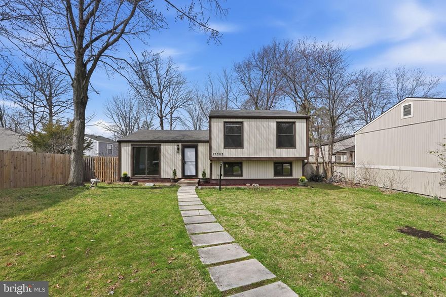 Welcome to this beautifully updated home on a quiet cul-de-sac in the heart of Reston. Featuring 3 bedrooms, 2 bathrooms, and multiple living areas, this home offers a functional layout with great natural light and freshly painted interiors. The bedrooms are generously sized, providing comfortable everyday living. The kitchen is equipped with  stainless steel appliances, (all replaced in last few years), generous counter space, and heated floors.  Major updates include a water heater (2024), sump pump (2020), and sliding door (2026).  Flooring has been refreshed with Life-proof flooring on the upper levels and new carpet on the lower level (2023).  Additionally, the entire home has been freshly painted and ready for a new owner to make their own mark! Step outside to a sunny, fully fenced backyard with a deck—perfect for entertaining, relaxing, or everyday use. 2-car concrete parking pad is in front of house with additional street parking available. Enjoy all that Reston has to offer, including miles of trails, pools, tennis courts, and easy access to the Silver Line Metro, Reston Town Center, shopping, dining, and major commuter routes.