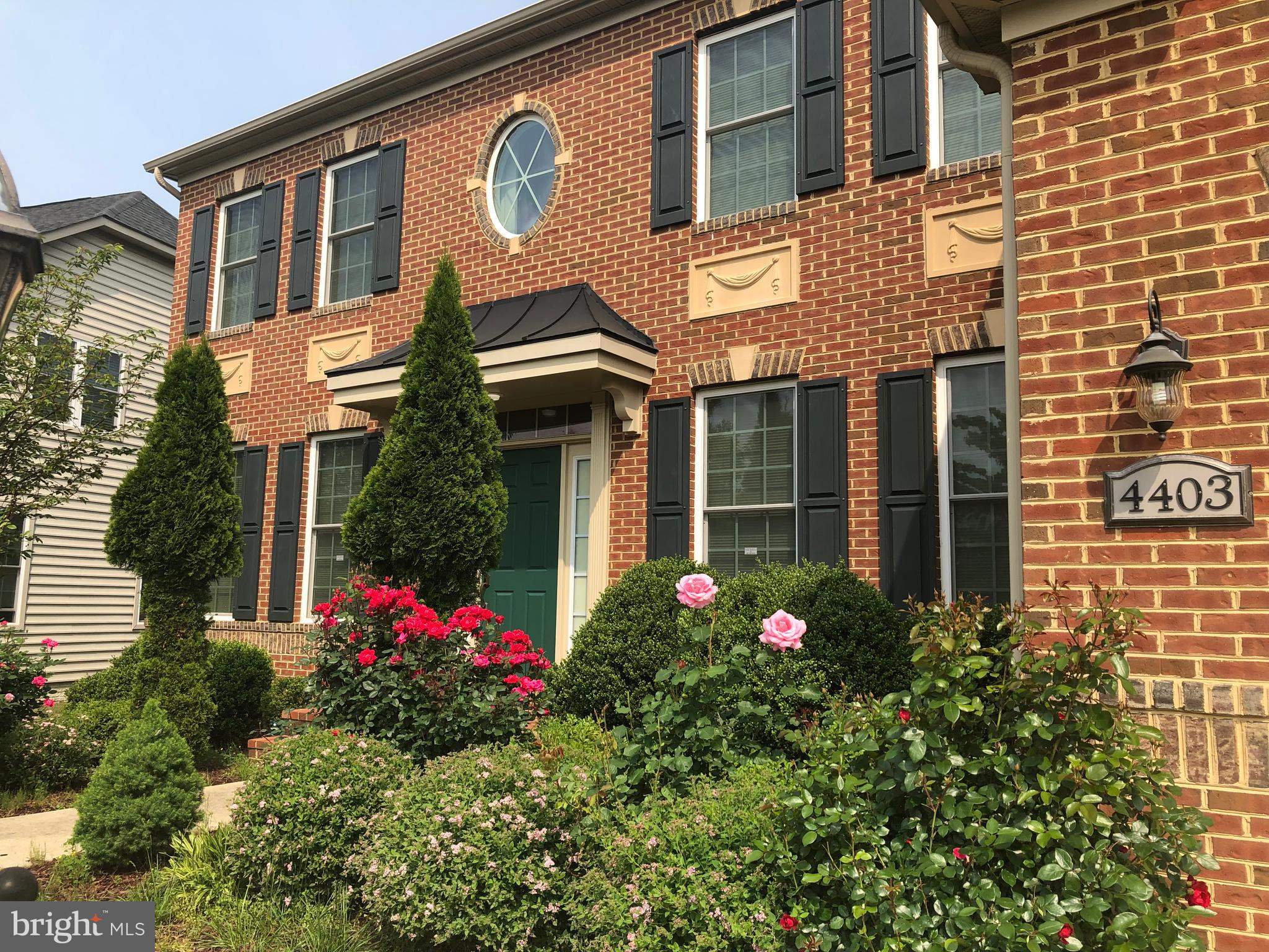Price Reduction!!! Welcome to 4403 Cedar Reach Lane, a beautifully appointed 4-bedroom, 4.5-bathroom estate home located in the prestigious "The Reach" at Fairwood. Built in 2016 and meticulously cared for by its original owner, this expansive 6,000 square foot residence spans three finished levels and offers the perfect combination of elegance, functionality, and comfort.
The main level welcomes you with an inviting foyer framed by architectural columns and adorned with crown moulding and classic wainscoting, creating a sense of refined sophistication from the moment you enter. Gorgeous hardwood floors flow throughout the main living spaces, including a formal dining room ideal for hosting gatherings and a gracious living room featuring a cozy gas fireplace. The private home office is a standout, offering custom built-in cabinets and shelves—perfect for those who work from home or desire a stylish study space. At the heart of the home lies a spacious and light-filled family room with vaulted ceilings, seamlessly connected to the gourmet kitchen. Designed for both everyday living and entertaining, the kitchen boasts abundant cabinetry, expansive granite countertops, a gas range, large island with bar seating, and a sunny eat-in area that opens directly to the Trex deck. A convenient laundry/mudroom off the oversized two-car garage and a stylish powder room complete the main level.
Upstairs, the luxurious primary suite features dual walk-in closets and a spa-like bathroom with a soaking tub, glass-enclosed shower, and dual vanities. Three additional spacious bedrooms offer ample comfort and are serviced by two full bathrooms—one Jack-and-Jill and one en suite—ideal for family or guests.
The lower level is expansive, with approximately 75% finished space that includes a large recreation room and a full bathroom. There are also rough-ins for a wet bar and an additional bathroom, providing the flexibility to create a home gym, theater room, or even a fifth bedroom. A walk-out from the basement leads to the beautifully landscaped backyard, which backs to protected preserve land, offering privacy and stunning natural views year-round.
Outdoor living is exceptional with a custom Nicolock paver patio and a low-maintenance Trex deck that flows seamlessly from the kitchen area, creating a perfect space for entertaining or relaxing. The home is just a short walk from one of Fairwood’s many playgrounds, and residents enjoy access to top-tier community amenities including a pool, clubhouse, and over seven miles of scenic walking and biking trails. Conveniently located near Bowie Town Center, Allen Pond Park, Whitemarsh Park, golf courses, and major commuter routes like Route 50 and Route 301, this home truly has it all.
4403 Cedar Reach Lane is a rare opportunity to own a beautifully maintained, move-in ready home in one of Prince George’s County’s premier communities.