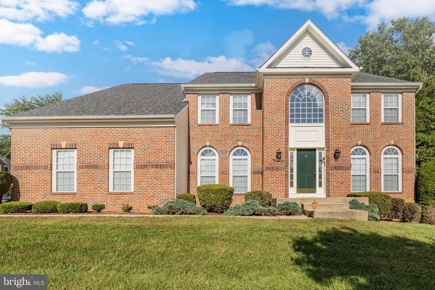 Welcome to The Ashley! This is luxury living at its best with over 6,000 square feet in the very popular Simmons Acers Community. This corner lot home was the builder's model and has all the bells and whistles you want to include distinctive architectural details, columns, chair rails, medallion wall décor, and a tray ceiling. As you enter through the grand two-story foyer take a moment to breathe and observe the gleaming hardwood floors, formal dining room to your left and living room to your right. Walk forward to take notice of the marvelous t-shaped staircase.
 
On the main level you will find it easy to work from home with a home office set back in the right rear corner. As you round the corner, the family room is understated, it's huge in size with natural light and a gas burning fireplace. The gourmet kitchen has the latest in culinary appliances and boasts a center island cooktop stove with grill insert, wall mounted oven and built-in microwave. Hosting or just simply relaxing in this home is effortless, just off the kitchen you will sit in the sunroom and enjoy sipping your morning cup of Joe. 
 
The second level is a treat, three large stately bedrooms and a fourth bedroom is a massive owner's suite. The owner’s suite is a retreat at home. The bathroom was designed to accommodate two at the same time with a walk-in shower, large soaking tub and double vanities make for a quick morning exit. The main area of this suite is spacious and ready to welcome any style of design. Lastly, the mere spaciousness of the adjoining sitting room will amaze the most reserved buyers as you unwind from a long day with a glass of merlot, soft music, and turn on the second gas burning fireplace. 
 
The lower-level screams Game Day, Party, Cinema, and Fitness. Whatever your sport, the basement is designed like your local sports bar. The lavish bar has running water, refrigerator, and microwave for your convenience. Why spend the money and time to visit the gym when it’s just a few steps away? A dedicated home gym is one way to stay fit.
 
Simmons Acres is a quietly kept secret with trails, low traffic, two tot lots for the children, and its own private community pool. Come on in, the water is great. Image a community where your neighbors waive hello and talk to you. It is suburban living at its best. This magnificent home has features that are cozy and comfortable yet elegant and dramatic and is waiting for you to call it “Home Sweet Home!"