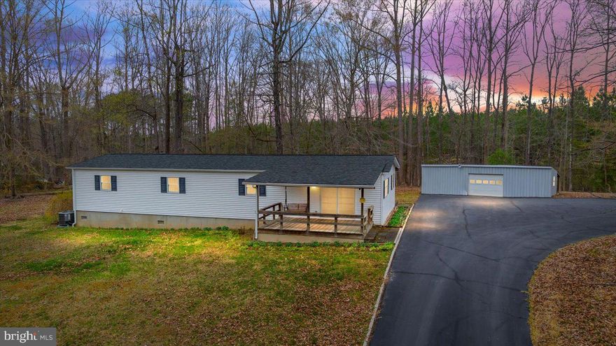 Secluded Comfort Meets Modern Convenience – 5900 Paynes Ln, Spotsylvania, VA 22551 - Tucked away on 2.8 acres of serene, partially wooded land, this charming 4-bedroom, 2-bathroom home offers the perfect blend of privacy and convenience. Surrounded by nature and backing onto vast private wooded land, this 1,340 sq. ft. retreat provides a peaceful escape while remaining just minutes from shopping, dining, Interstate 95, Dominion Raceway, and the upcoming Kalahari Resort. Step inside to discover a traditional layout with thoughtful updates, including vinyl plank flooring, LED lighting, and a spacious eat-in kitchen. The kitchen boasts tons of cabinet space, a separate freezer, and a new refrigerator (2022), making it a dream for meal prep and entertaining. The family room’s sliding glass doors open to a huge front porch, inviting you to enjoy your morning coffee with the sounds of nature. The primary suite is a private retreat, featuring an attached bath, walk-in closet, and exclusive access to a secluded deck—perfect for unwinding after a long day. Three additional bedrooms provide ample space for guests, a home office, or hobbies.  Outside, the property shines with multiple decks, a covered picnic shelter, vibrant flower gardens, and two storage sheds. A detached 35x15 garage with power offers endless possibilities for a workshop, extra storage, or vehicle parking. Recent updates include a new house roof (2023), metal garage roof (2021), and whole-house generator (2021), ensuring peace of mind for years to come.  Whether you're seeking a private homestead, a weekend retreat, or a peaceful country home with easy access to modern amenities, this meticulously maintained property is ready to welcome you home!📍 Don’t miss your chance to own this hidden gem! Schedule your showing today!