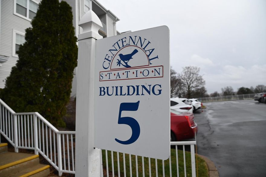 Welcome to one of the nicest homes you will find in the desirable and established 55+ development of Centennial Station. At almost 1,600 square feet, this 2nd floor Sandpiper Model is in pristine condition and boasts designer finishes and custom built-ins.  And to top it all off, this home has one of the best views in the development looking out over our beautiful 6 acre Courtyard and Fountain. The custom floor plan boasts 2 Main Bedroom Suites that are each doored off from the other living areas providing Maximum Privacy for those bedrooms. Ideal for a Snoring Spouse or a Live-In Helper.  In addition to the Spacious Living and Dining Areas you will also enjoy the use of a Private Office with Window and 15 Light Door.  Other upgrades include a Brand New Stainless Refrigerator, Drywalled Ceilings, New Hot Water Heater, Tiled Balcony,  Closet Organizer, 1 Year Old Oven, Newer Carpets, and a 2 Year Young Washing Machine. Don't worry about downsizing from your single home.  This spacious condo feels more like a 2 Bedroom Rancher than a condo and has all the room you're likely to need and storage galore with a 10 foot walk in closet and 6x6 outside storage closet.  Located in a dramatic sky-lit atrium building not found in any of the other local Active Adult communities. You'll get the convenience and low maintenance advantages of a condominium blended with single home features and sizes.  Building 5 is also one of only 3 buildings to have its own club room inside the building. Building 5 also benefits from a large recently renovated Otis Elevator As Well As Sprinklers Throughout Units And Common Areas. Fee Includes Trash, Snow, Water, Sewer, Cable T.V. Security System Monitoring, Master Policy Insurance Plus Activity Center W/Indoor Year-Round heated 25MPool,Exercise Room, Card Room, Billiard Room, And Grand Meeting/Banquet Room. Commercial Wing Has a convenient Real Estate Office offering free Notary, Faxing, and Copying for residents, Restaurant, Hair Salon, and Dentist. No dogs except service/support animals. Only one resident has to be 55 yrs old provided all other full-time residents are over the age of 18.